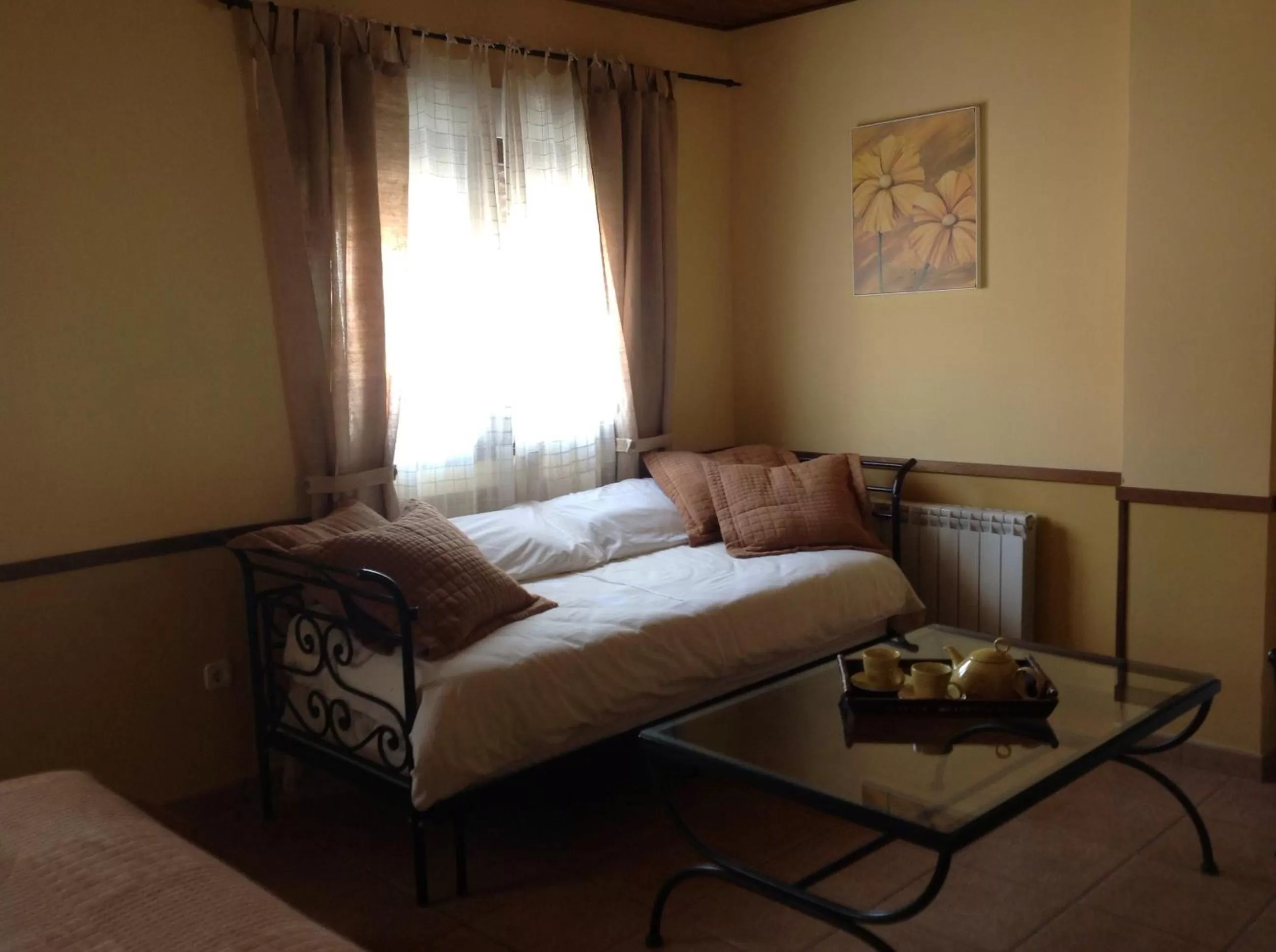 Seating area, Bed in Posada el Campanario