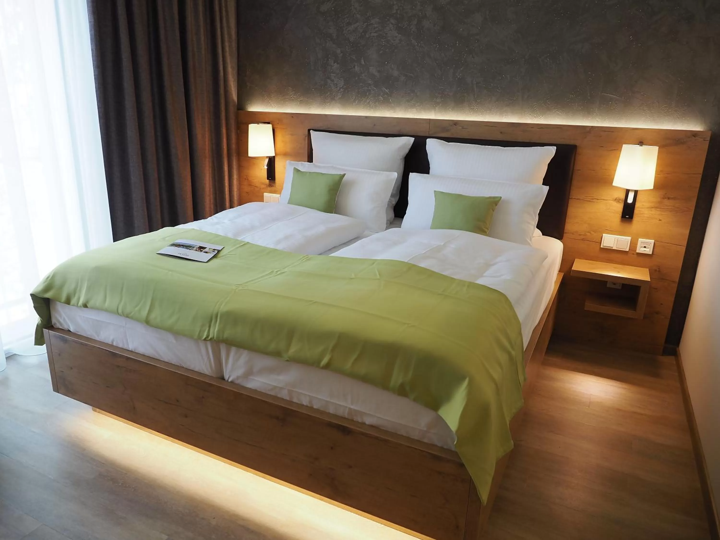 Bed in PETERS Hotel & Spa