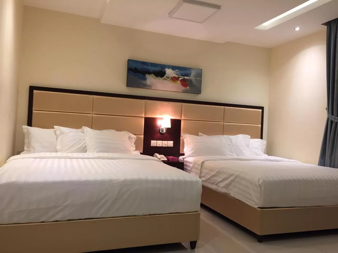 Bed in Arjaan Altakhassusi Hotel Suites