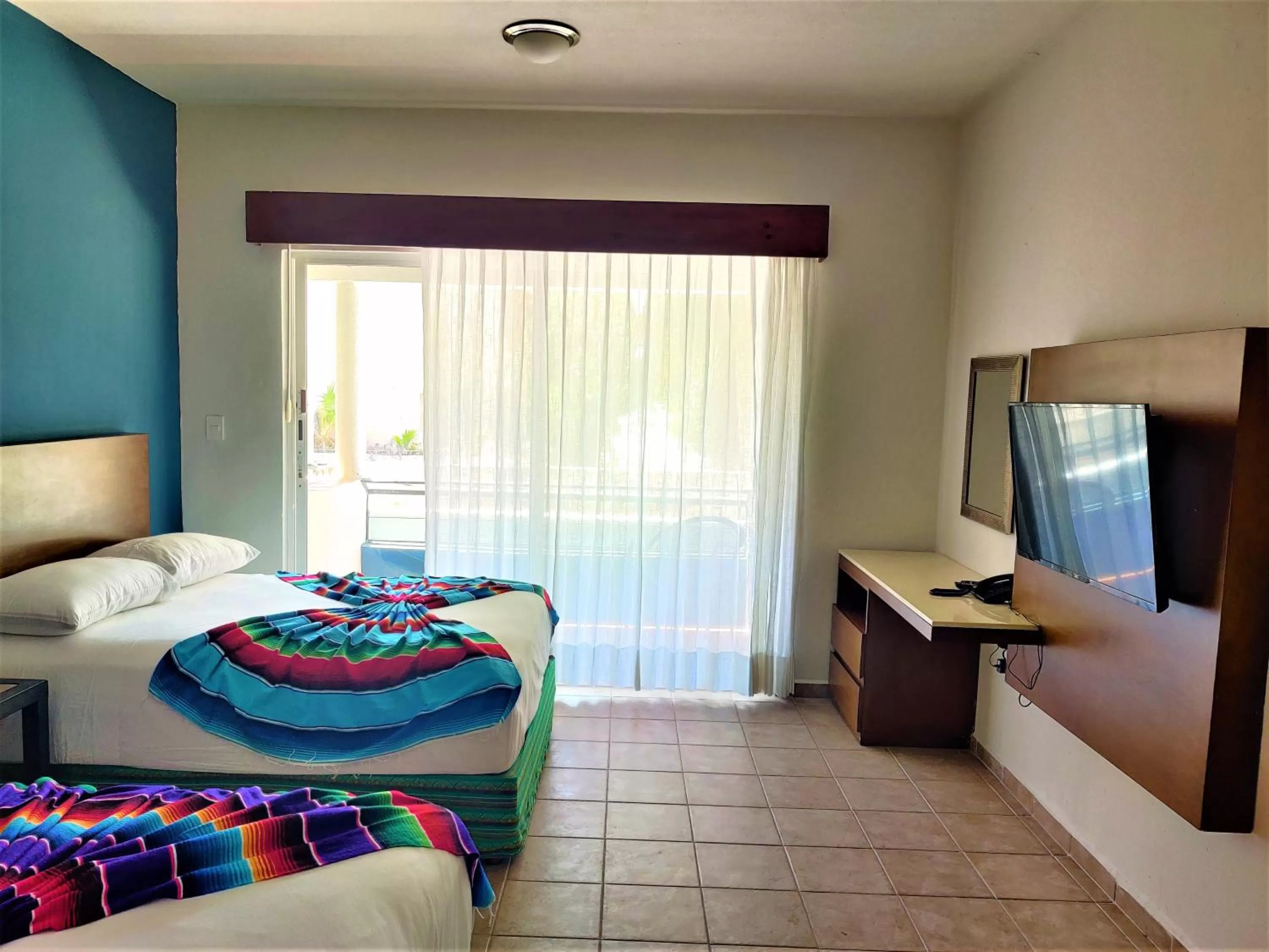 Photo of the whole room, Bed in Hotel Mariachi by Kavia 5th Av