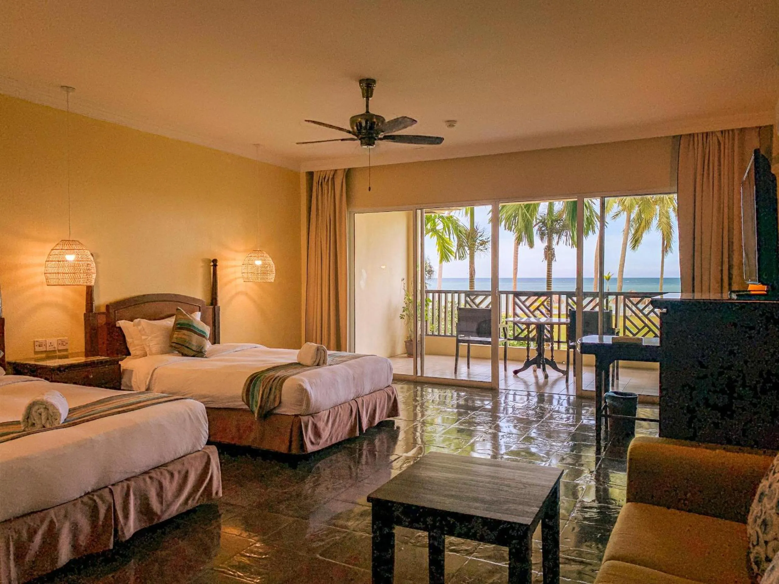 Bed in Palm Beach Resort & SPA