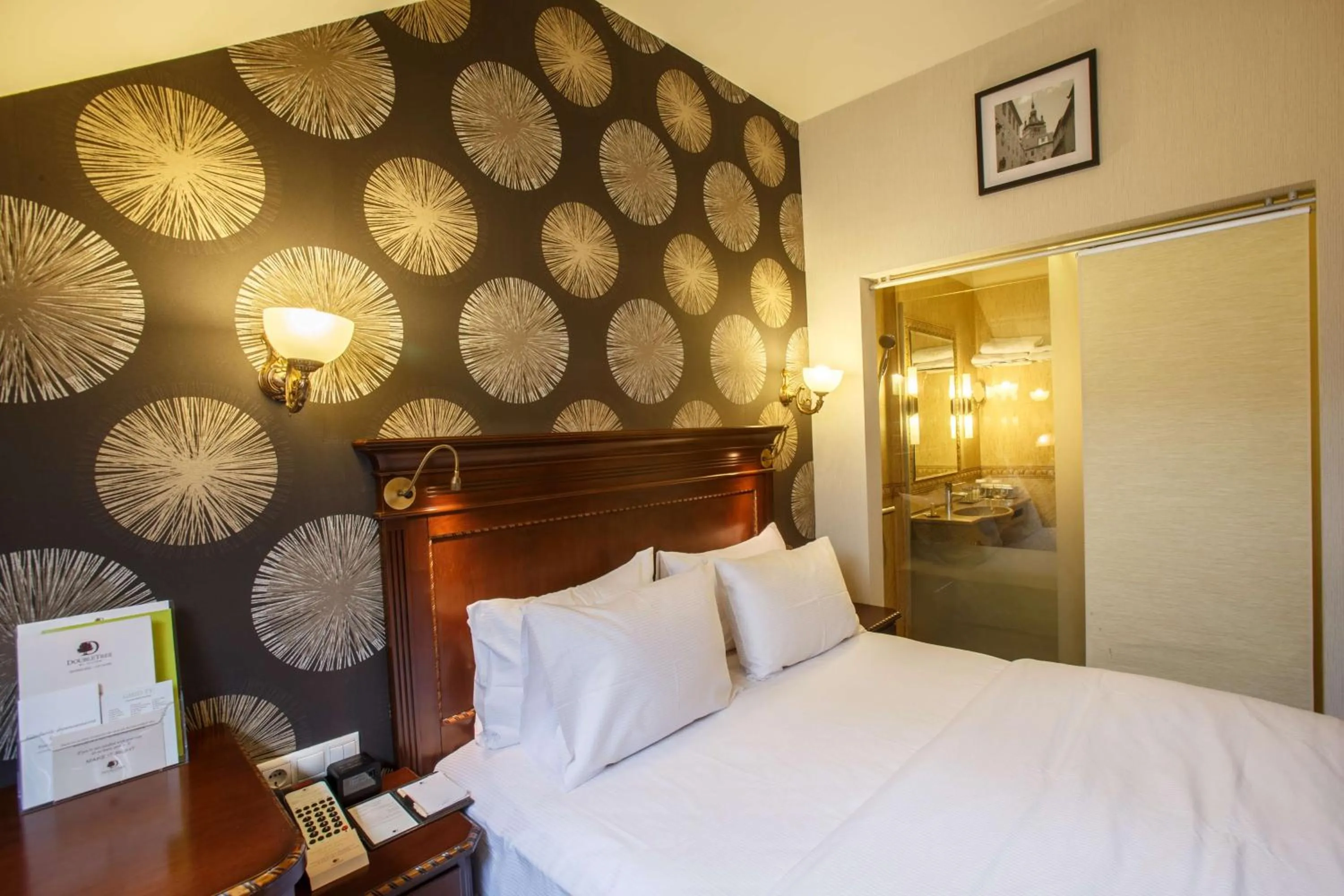 Bathroom, Bed in DoubleTree by Hilton Hotel Sighisoara - Cavaler