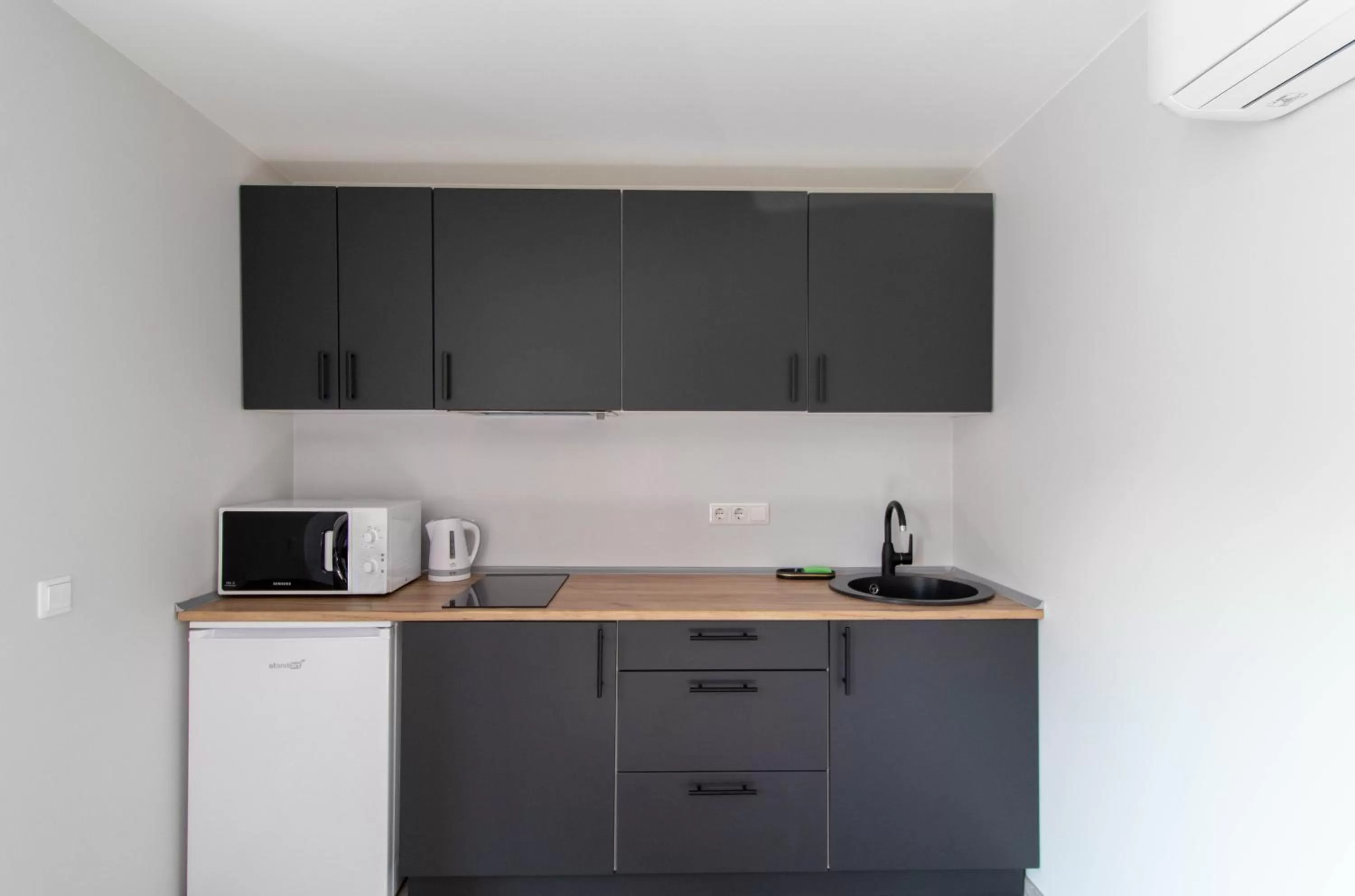 Kitchen/Kitchenette in Dzukija Hotel