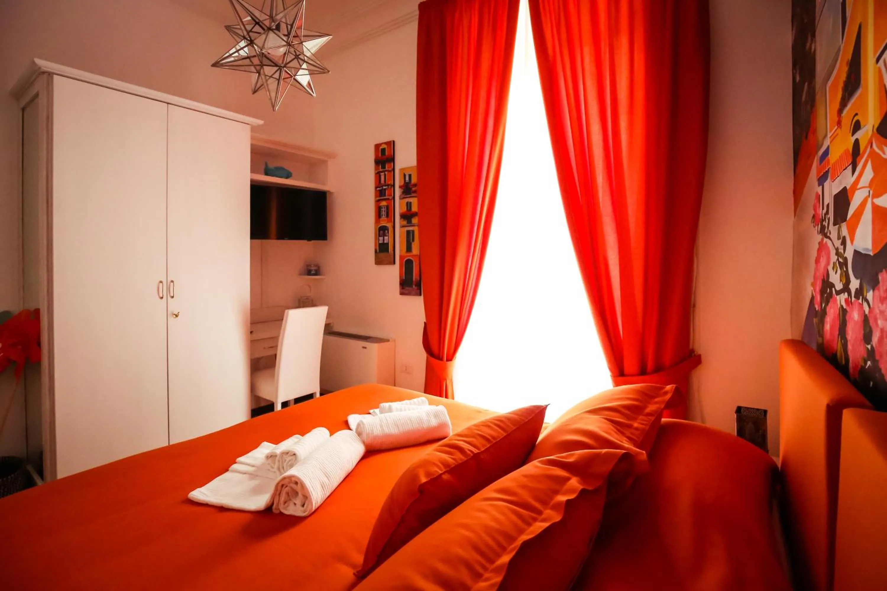 Bed in NapoliMia Boutique Hotel