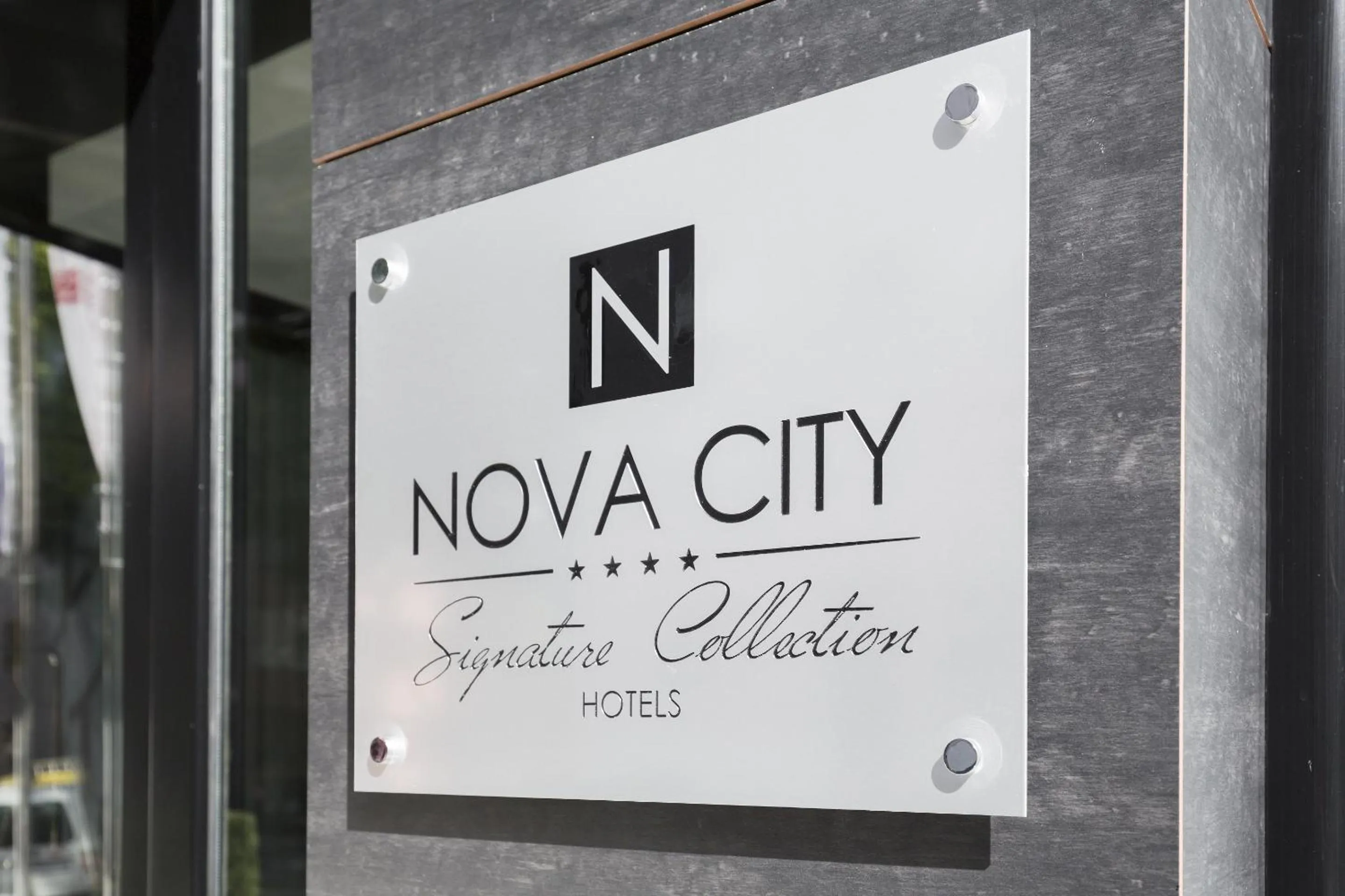 Property logo or sign in Nova City Garni Hotel Signature Collection