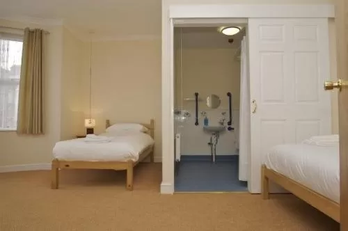 Bedroom, Bed in All Seasons Lodge Hotel