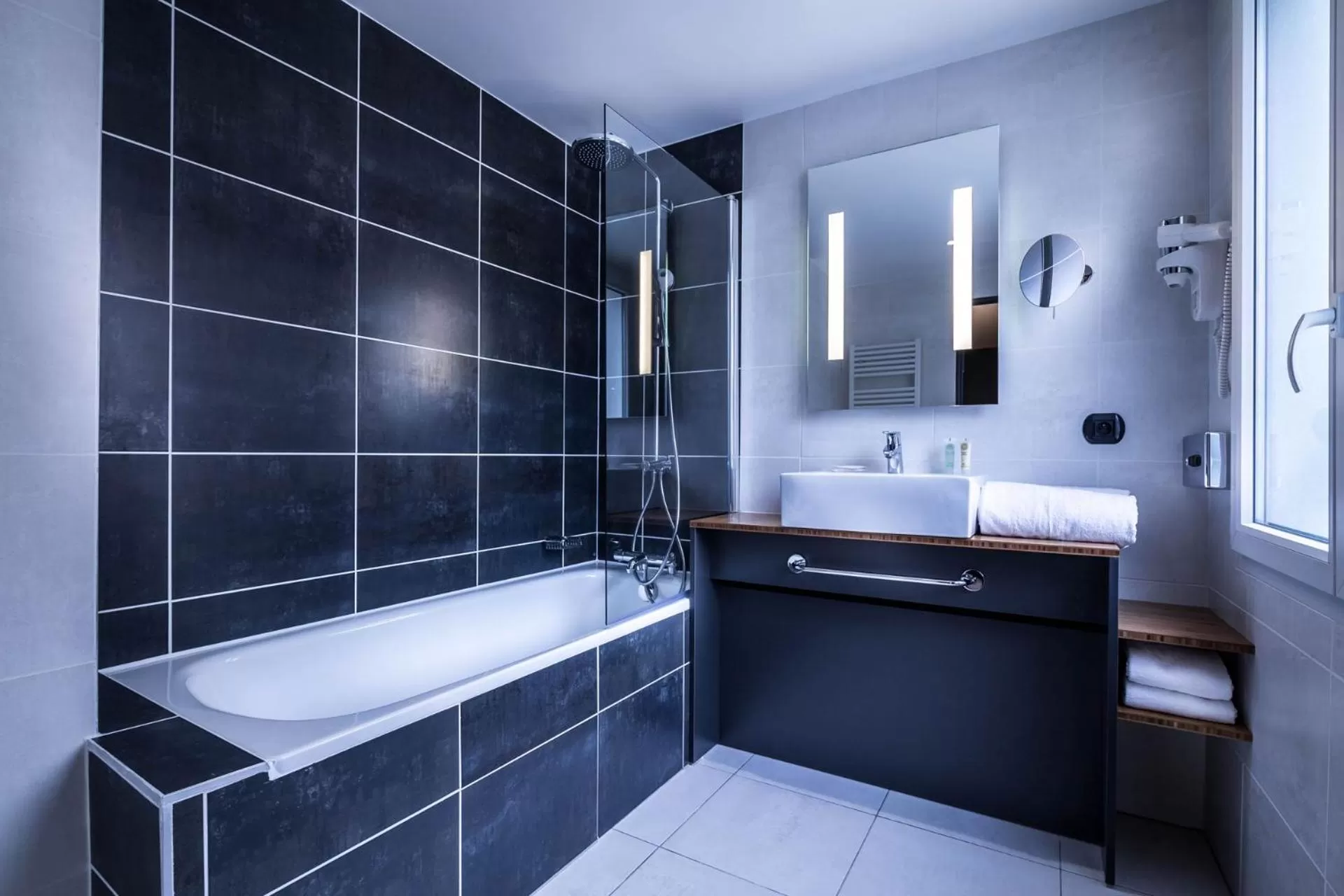 Bathroom in Best Western Plus Suitcase Paris La Défense