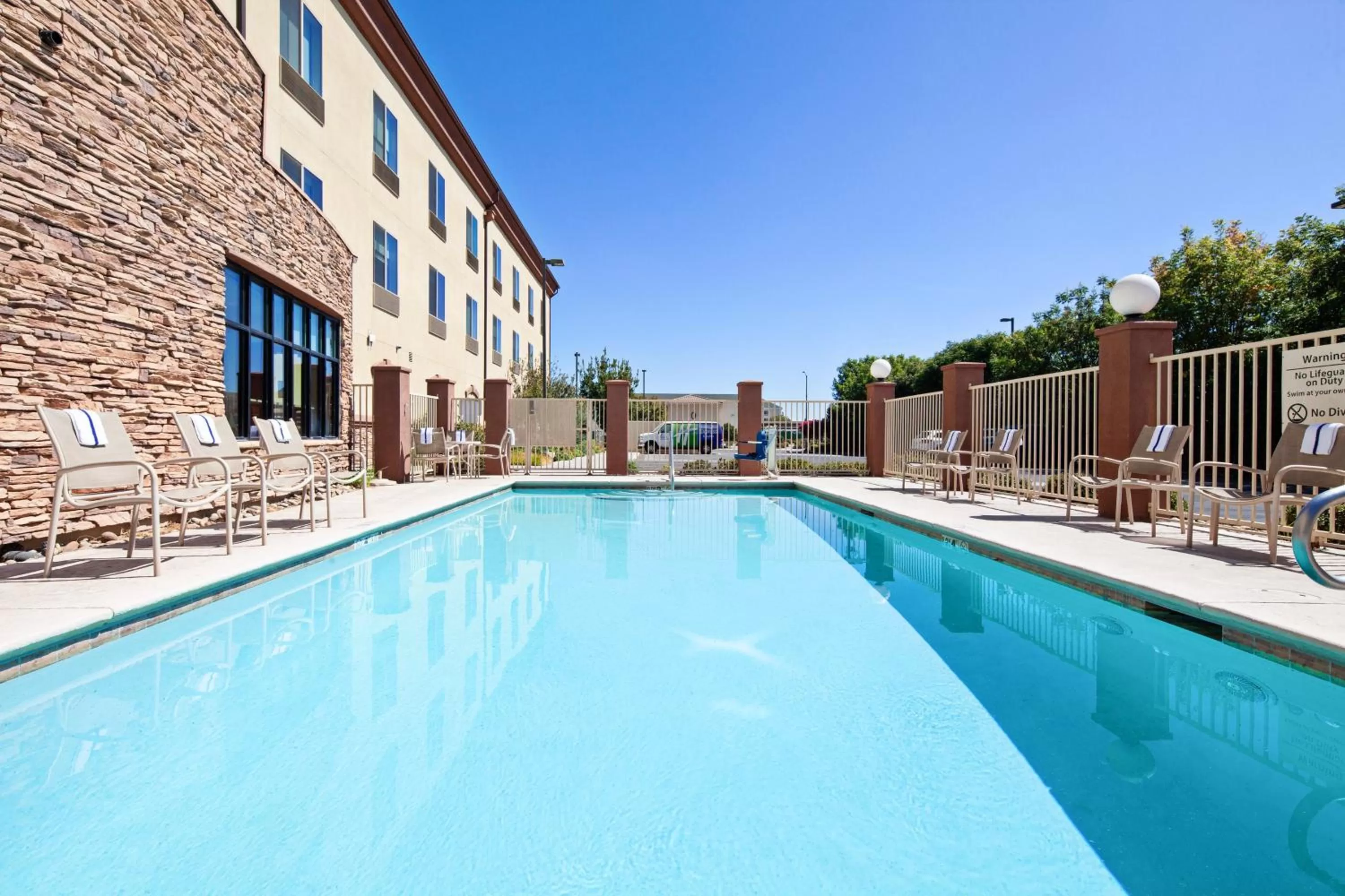 Swimming pool in Holiday Inn Express & Suites Clovis Fresno Area by IHG