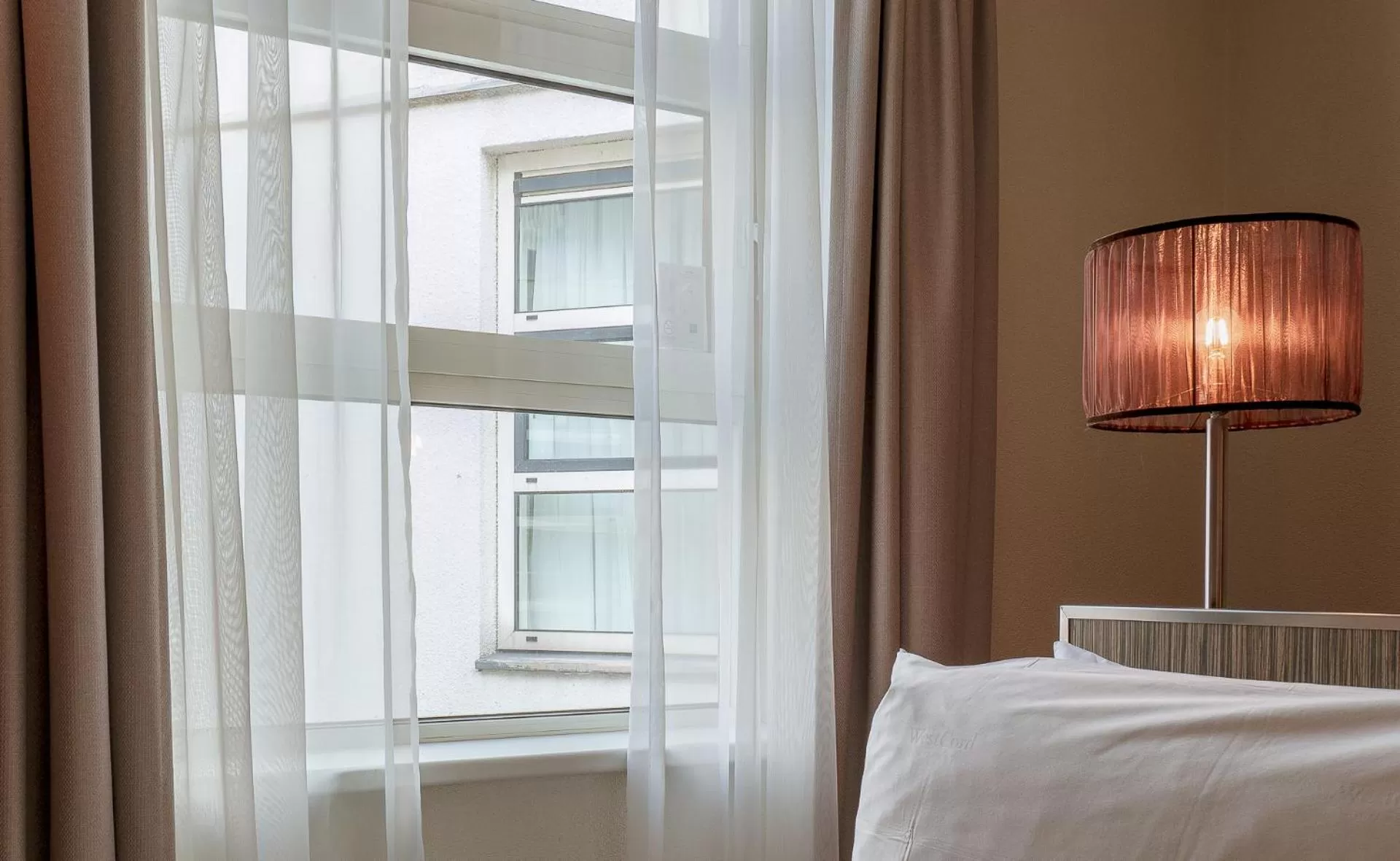 Inner courtyard view, Bed in WestCord City Centre Hotel