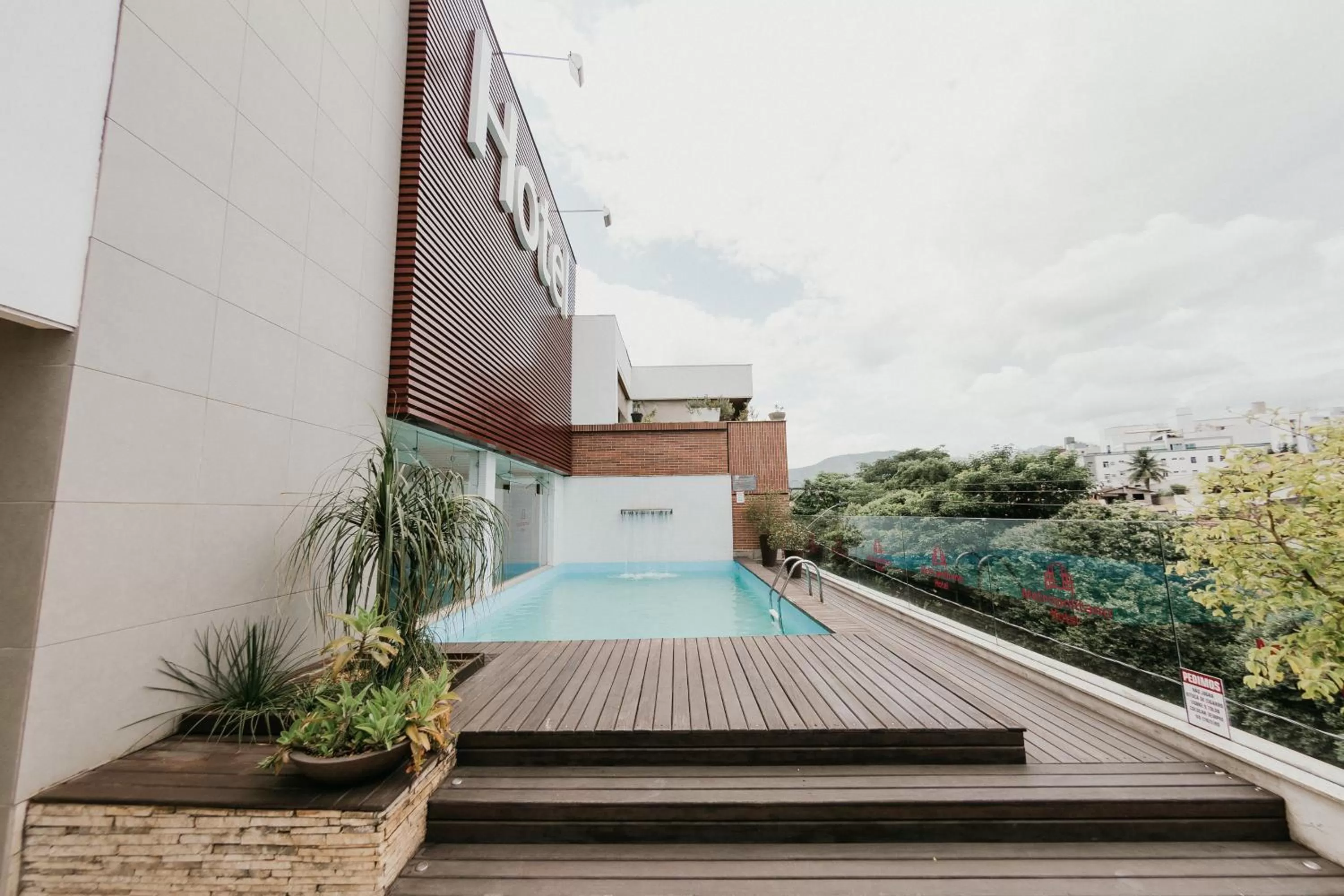 Balcony/Terrace, Swimming Pool in Hotel Metropolitano