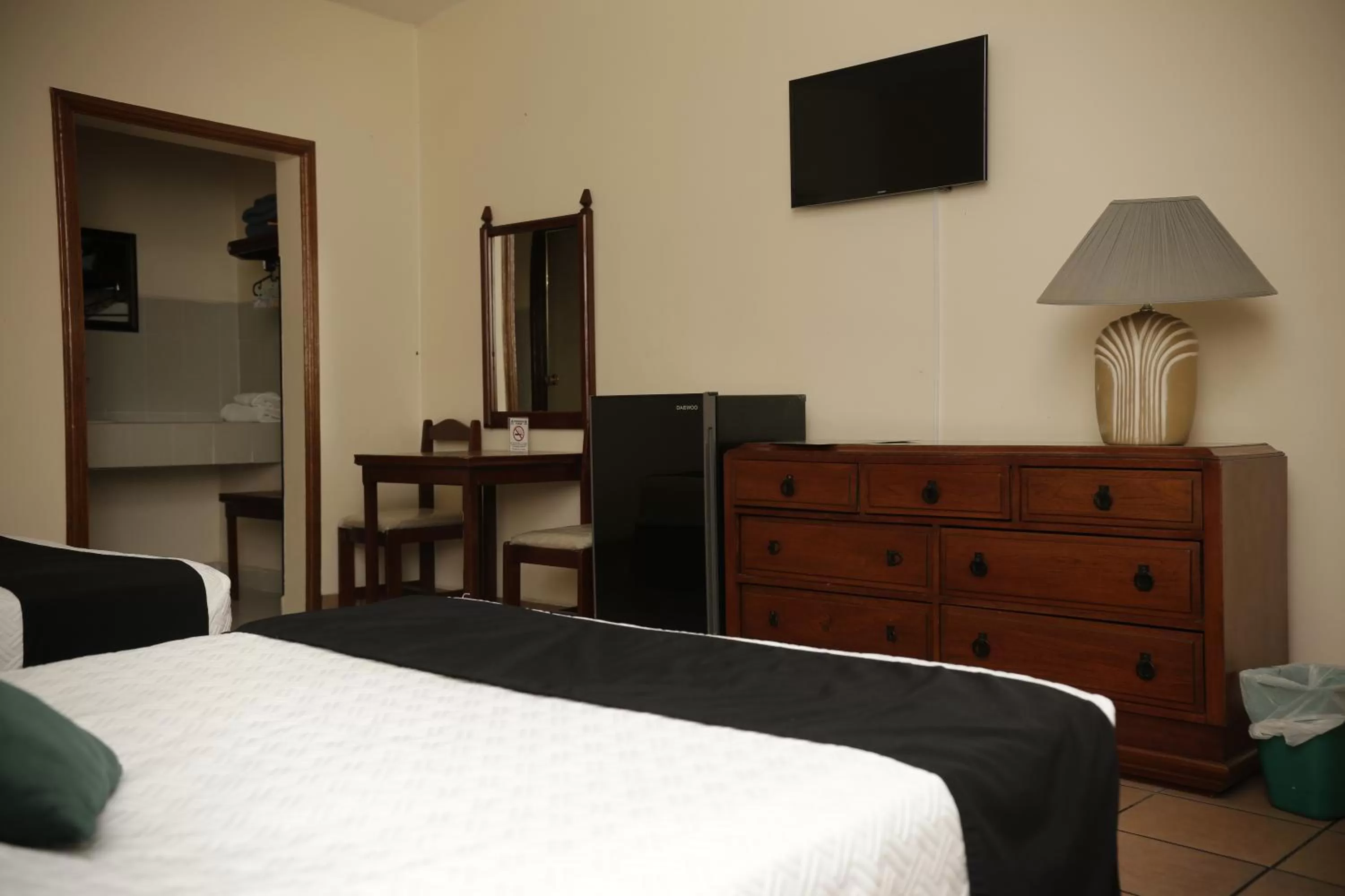 Bed in Hotel Posada Santa Fe Sabinas