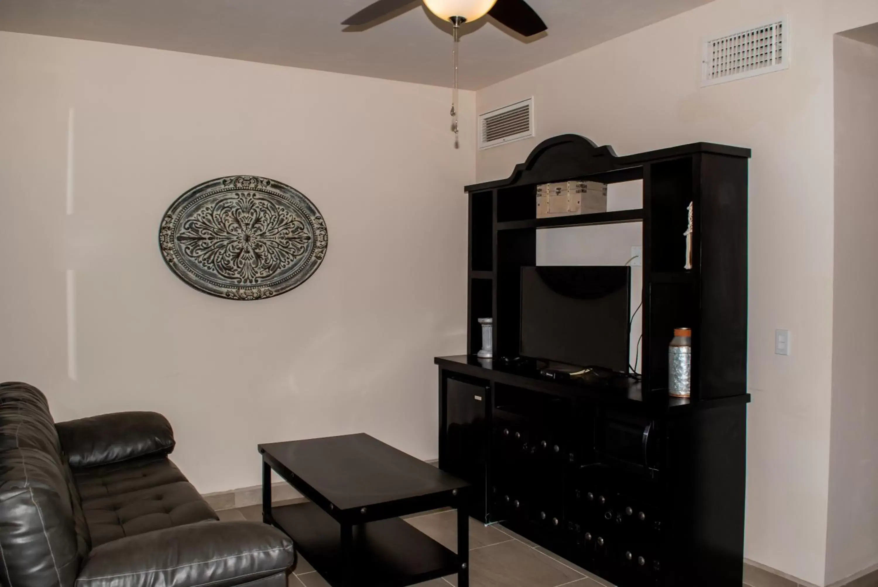 Standard Queen Room in Playas Hotel Suites Standard Queen Room in Playas Hotel Suites