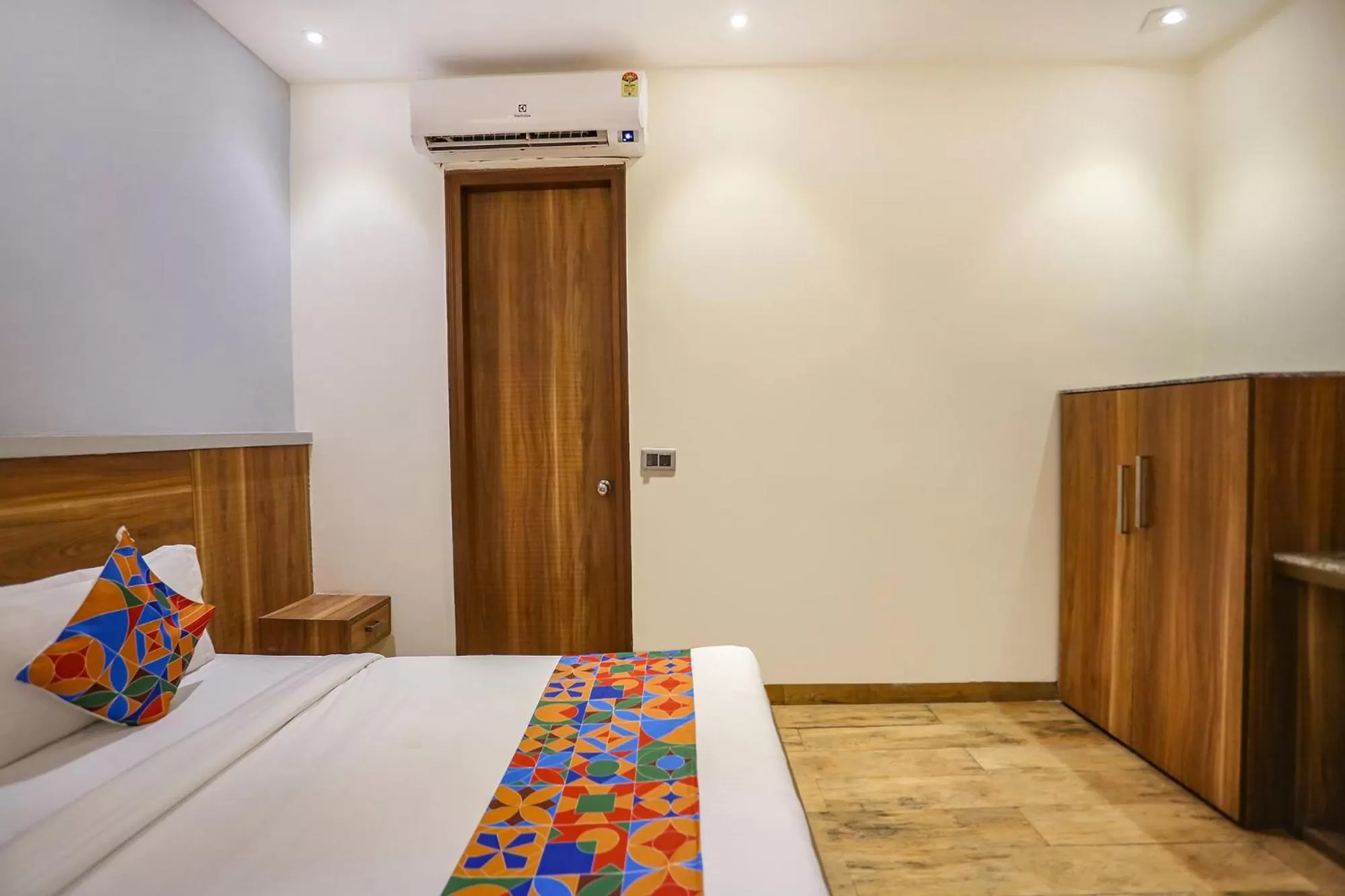 Bed in FabHotel Royal Touch Patel Nagar