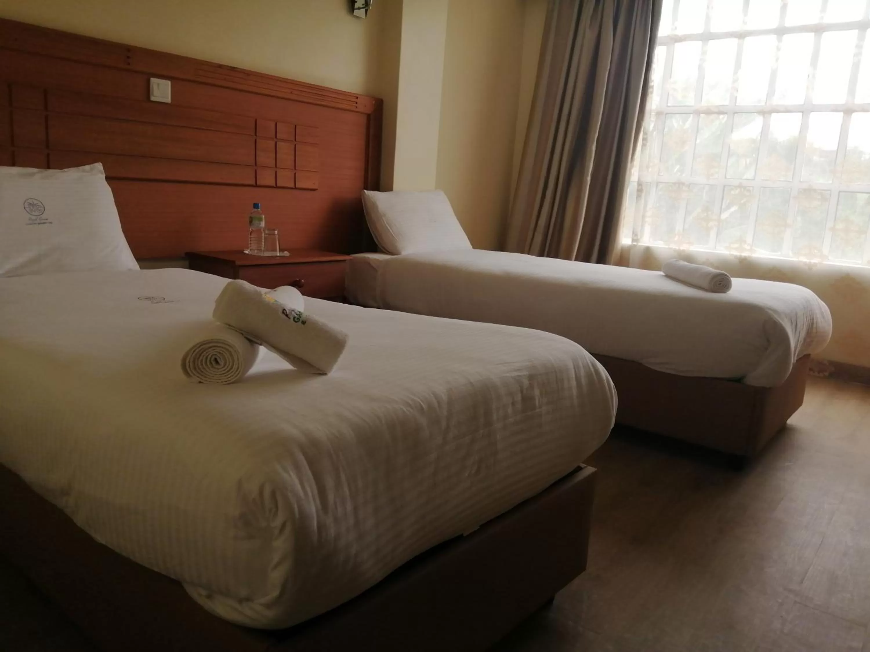 Bed in Royal Green Gardens Resort