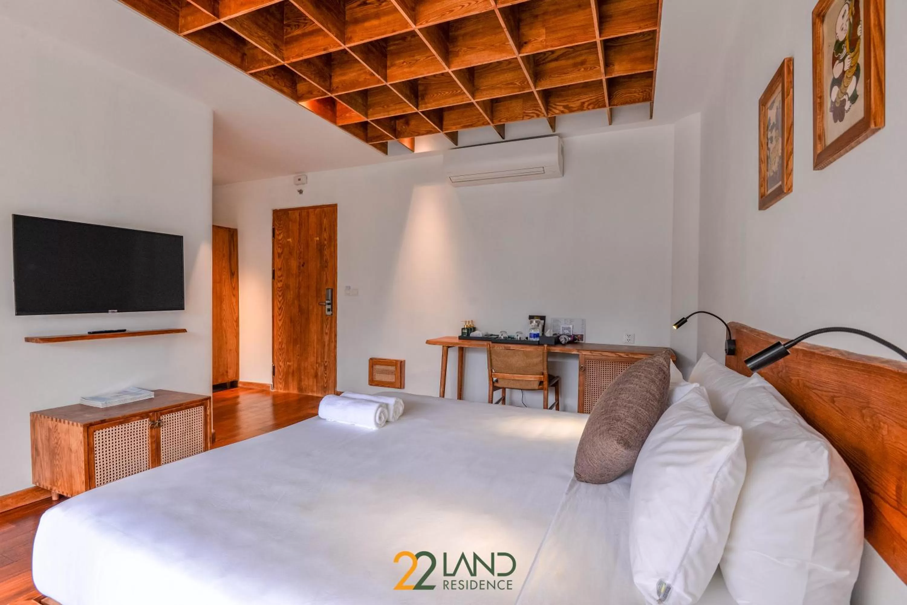 Communal lounge/ TV room, Bed in 22Land Hotel & Residence