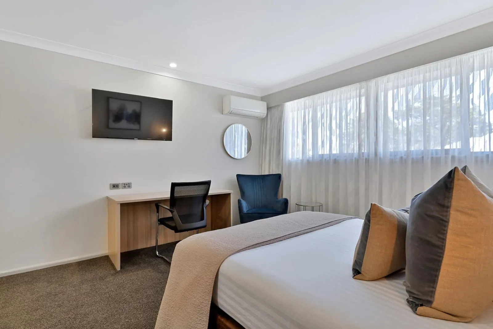 Bed in Central Caleula Motor Lodge