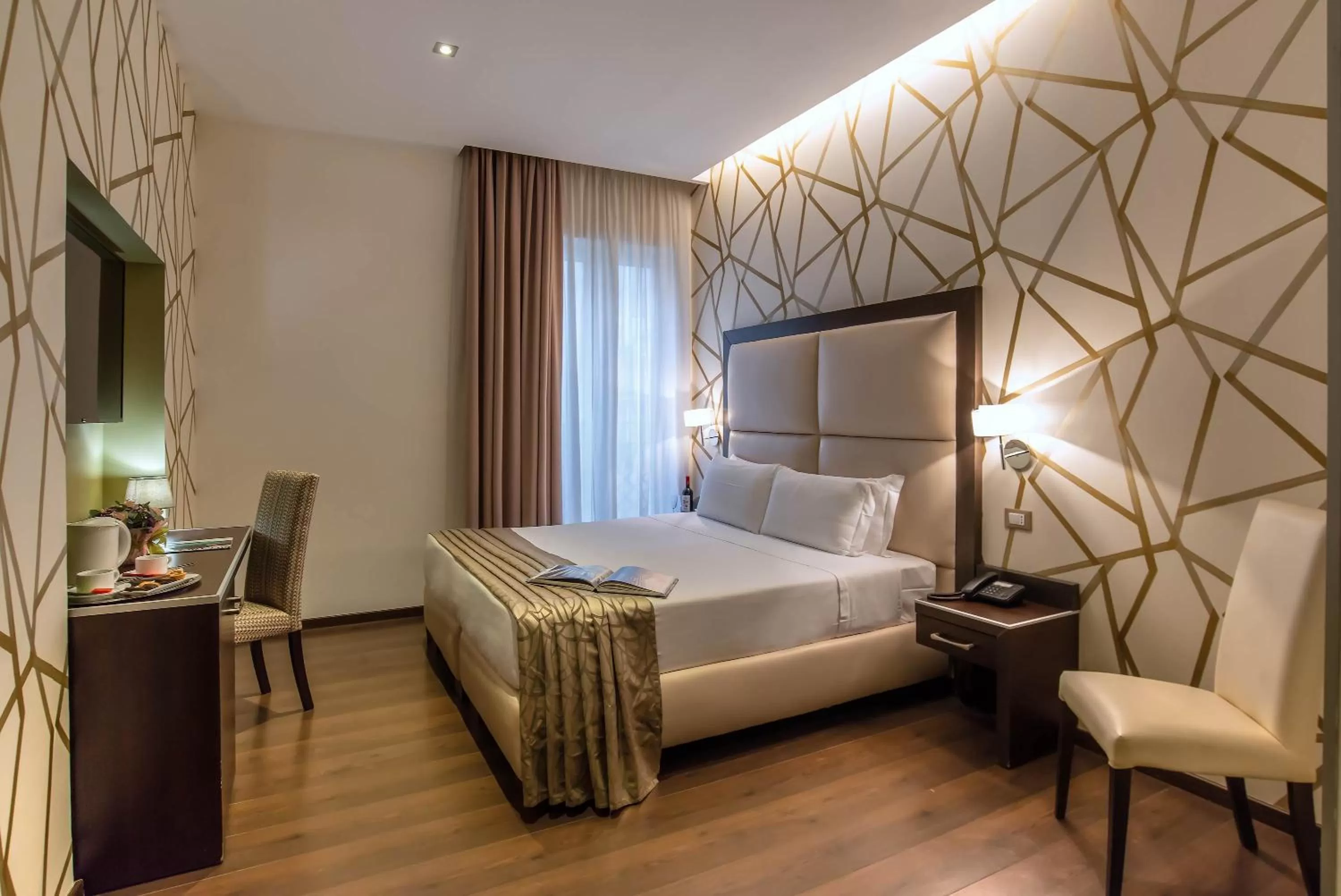 Photo of the whole room, Bed in Catone District Hotel