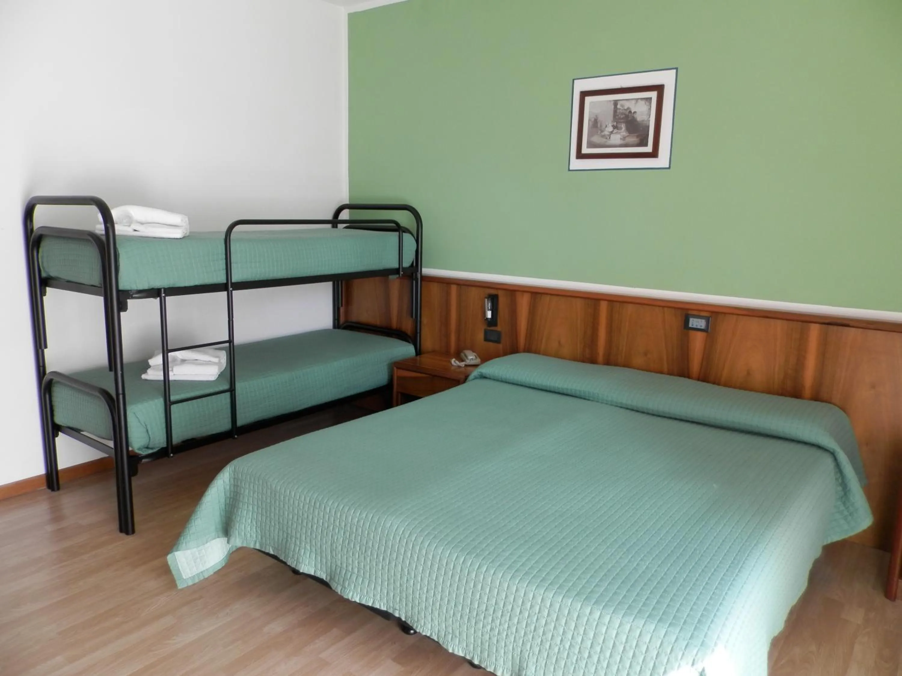 Bed in Continental Hotel