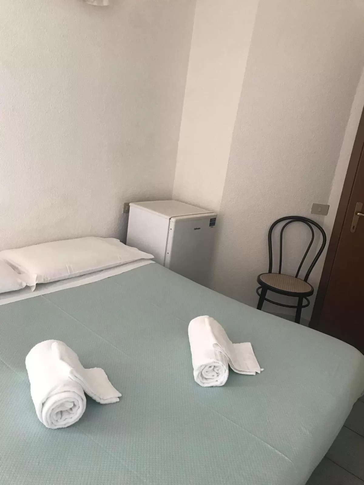 Bed in Hotel Carillon