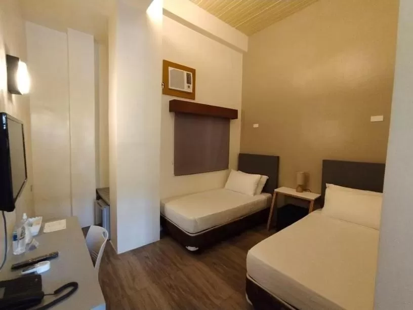 Bed in Zillion Pavilion Family & Business Hotel