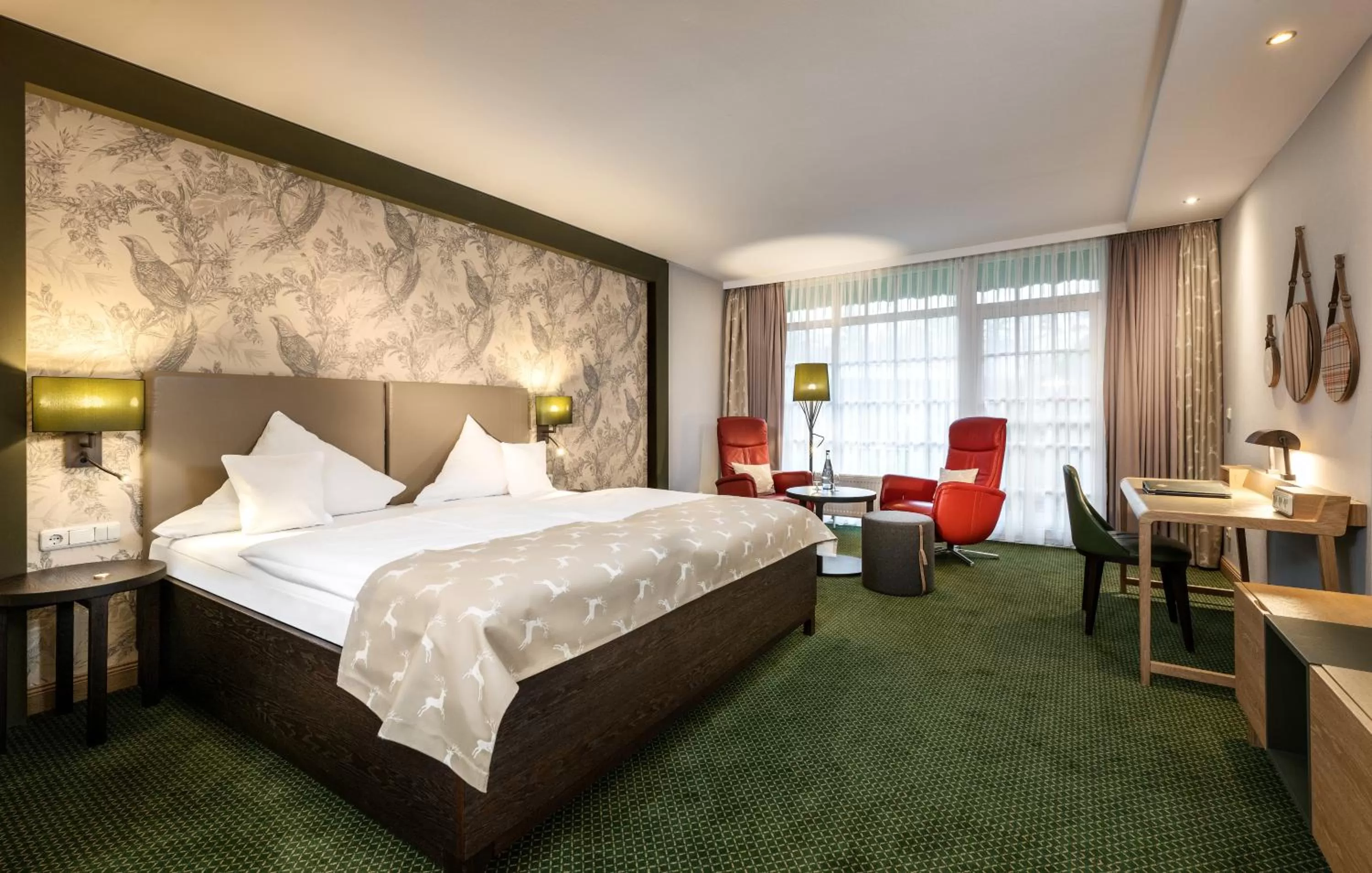 Photo of the whole room, Bed in Romantik Hotel Jagdhaus Eiden am See