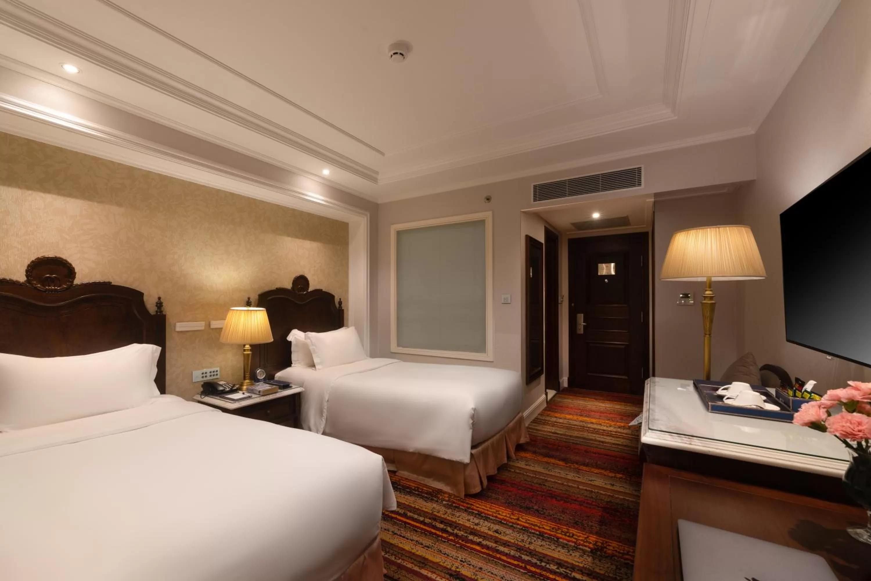 Bed in The Lapis Hotel