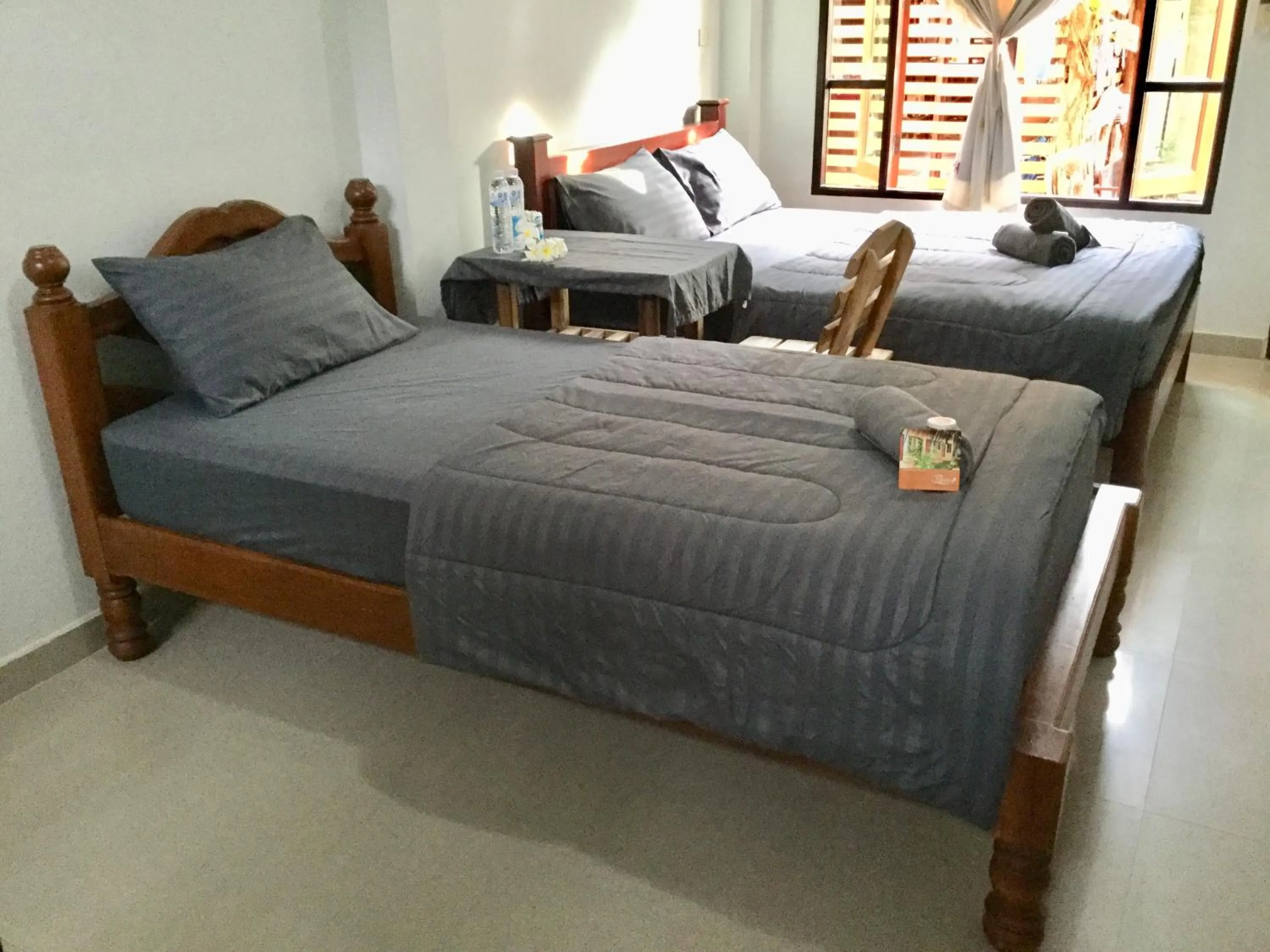 Photo of the whole room, Bed in Thai Guesthouse