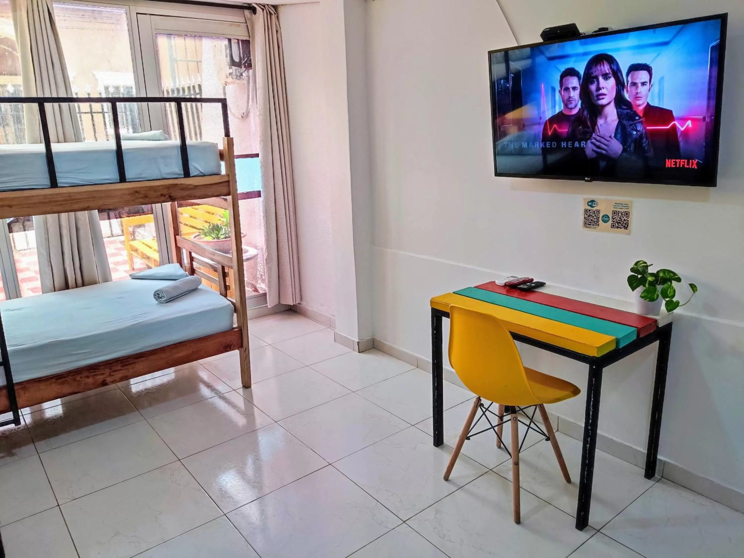 TV/Entertainment Center in Bona Vida Hotel