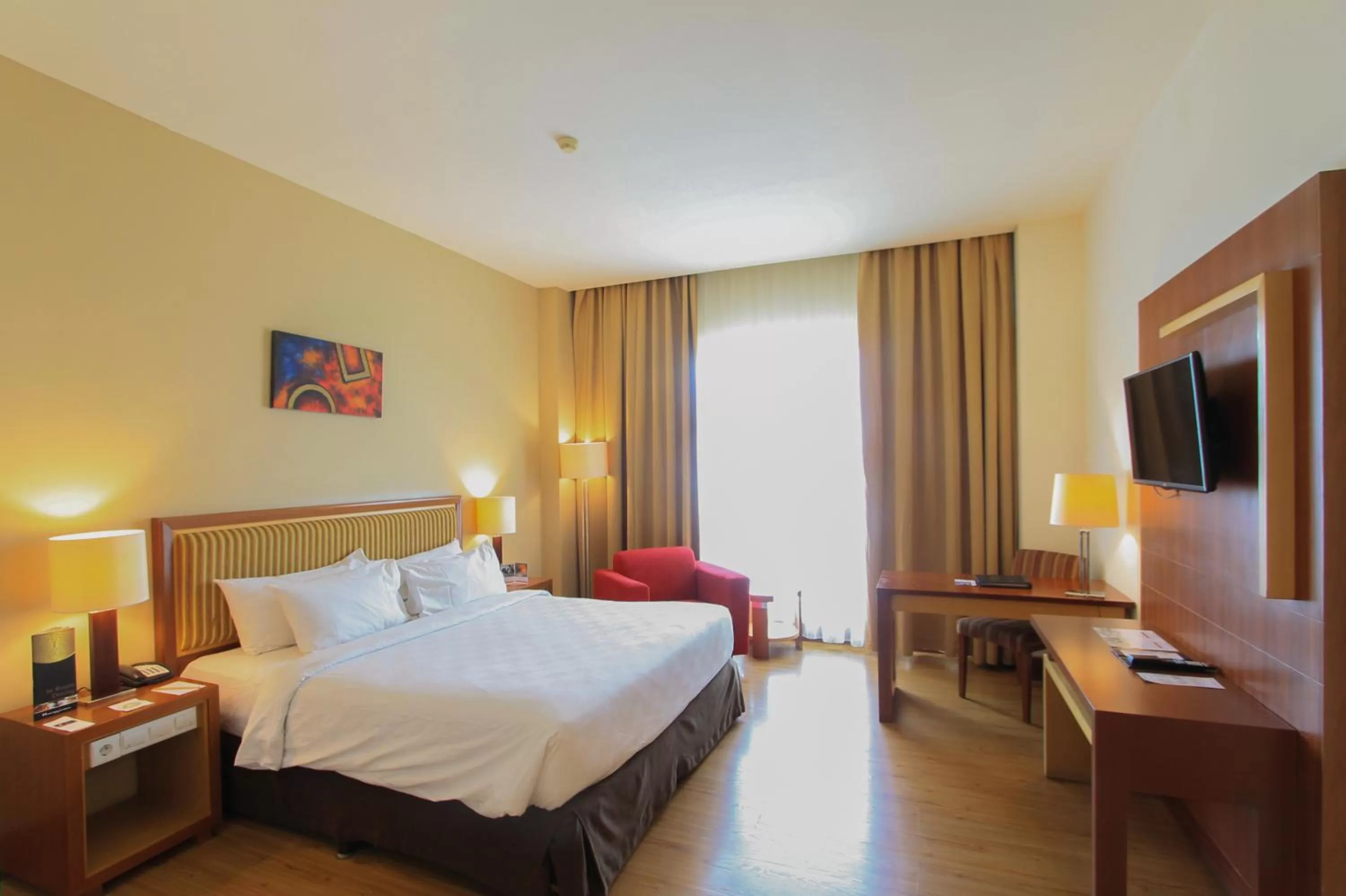 Photo of the whole room, Bed in Swiss-Belhotel Maleosan Manado