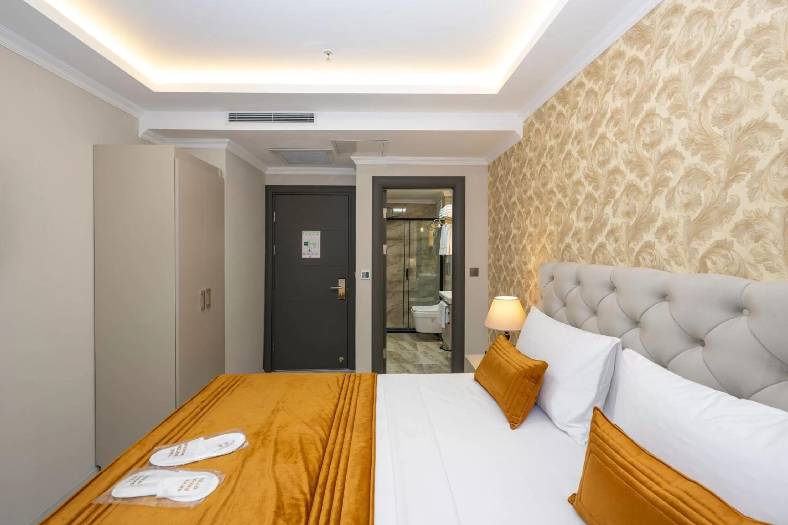 Bed in SKYSTAR DELUXE HOTEL