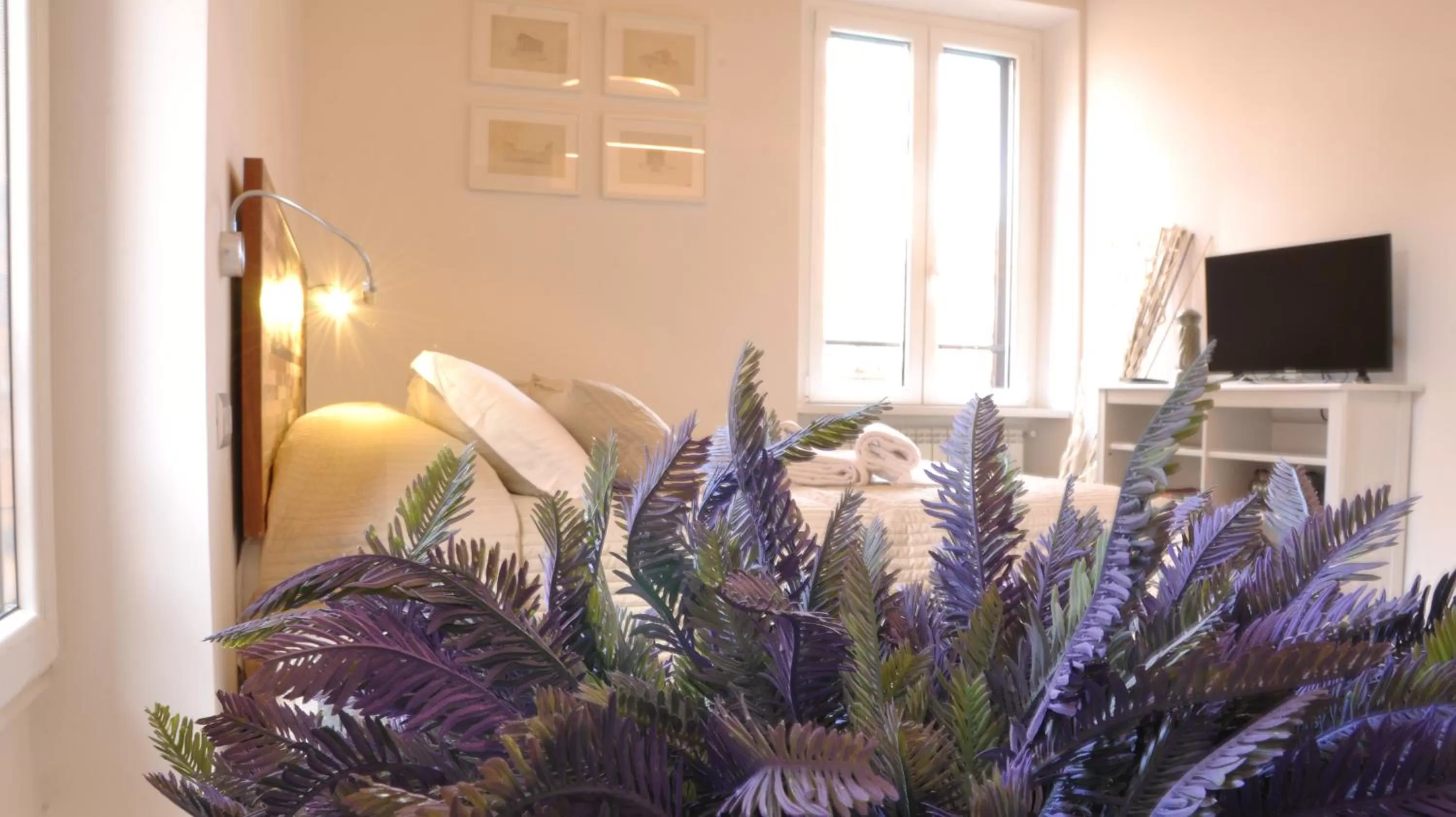 Communal lounge/ TV room in B&B Casa Angelini