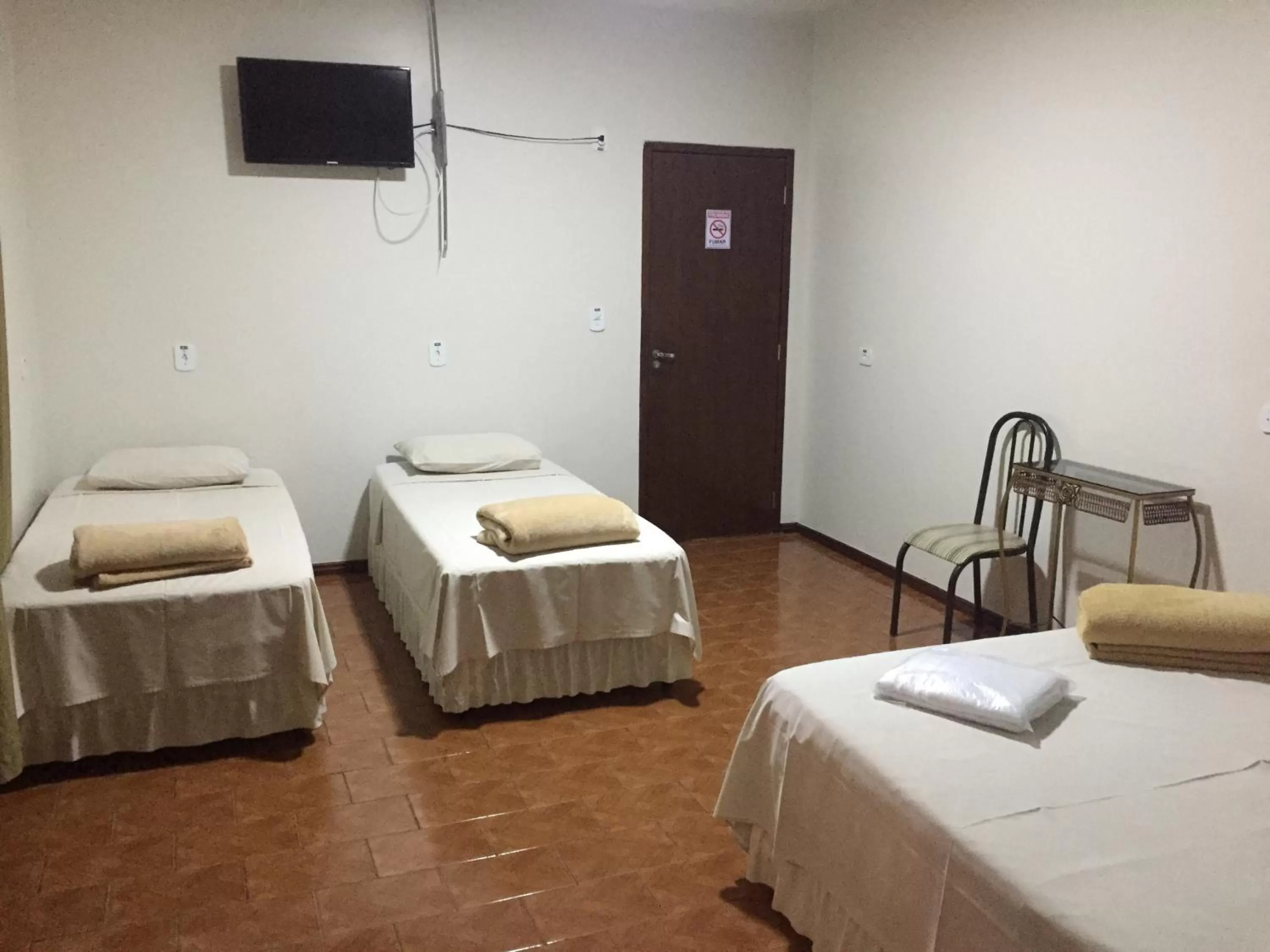 Bed in Hotel Paradizzo