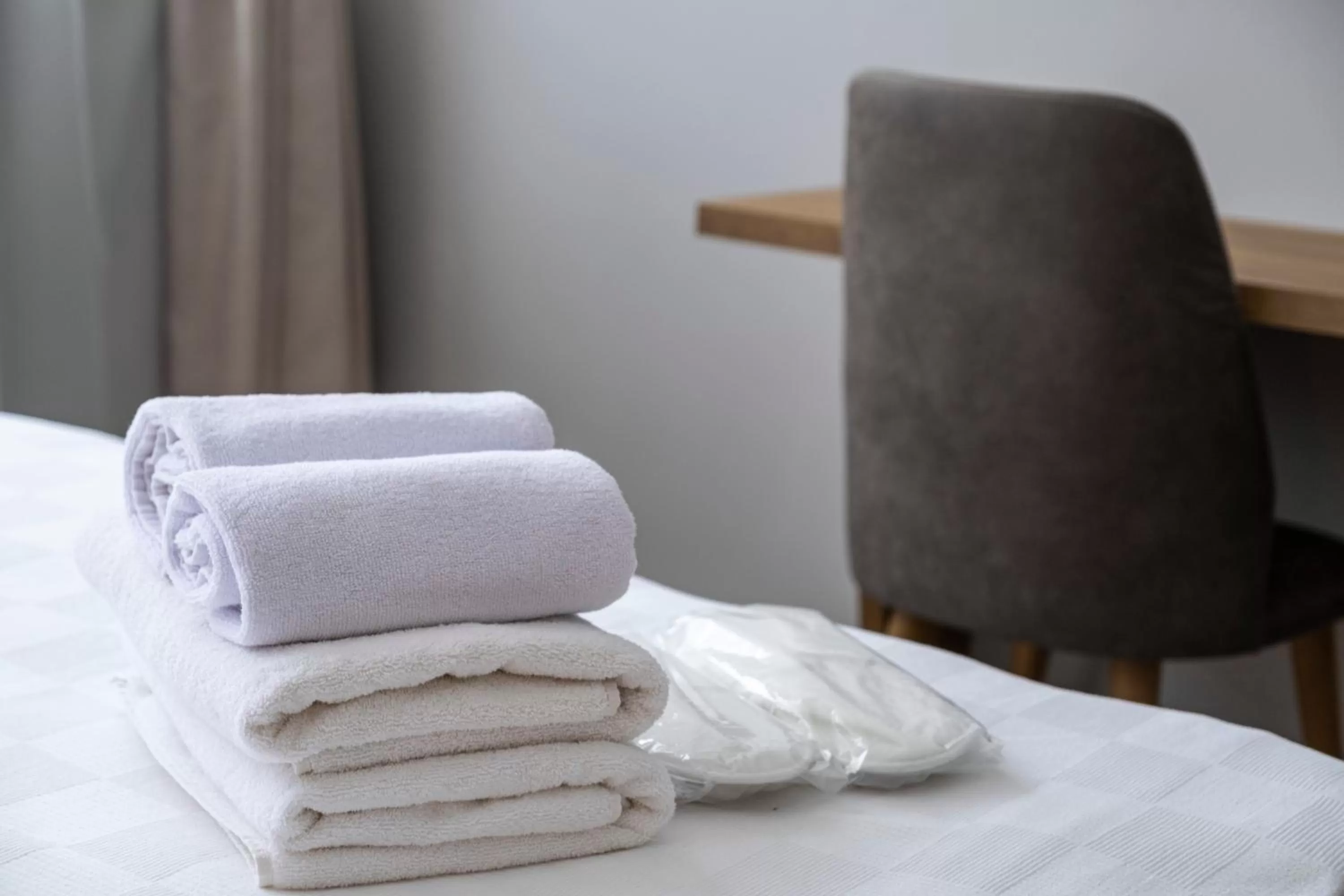 Bed in Comfort Center Suit Hotel