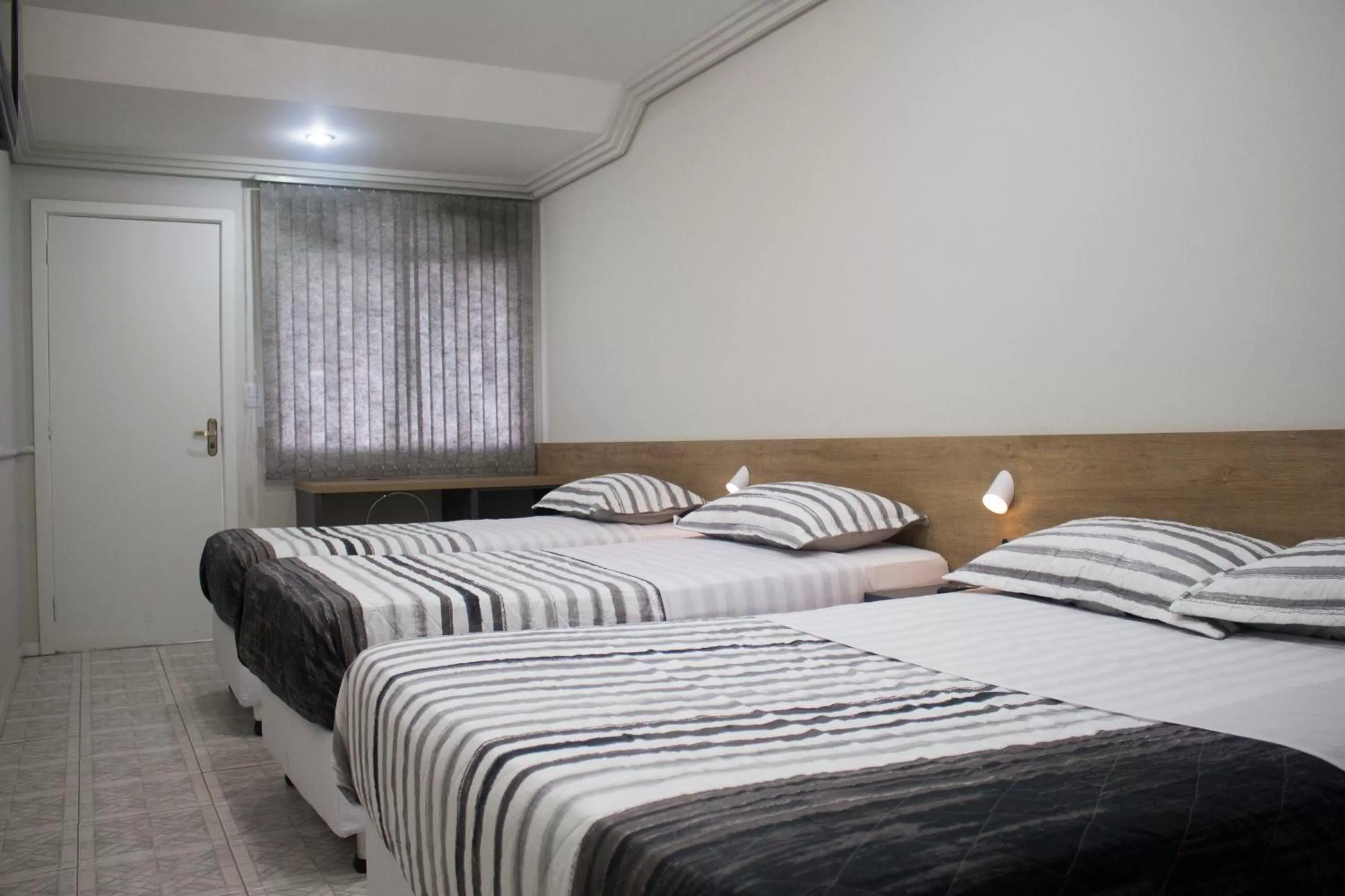 Bed in Hotel Dois Irmãos