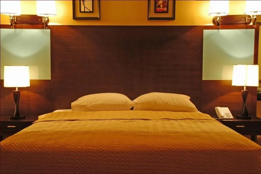 Bed in Galaxy Amman Hotel