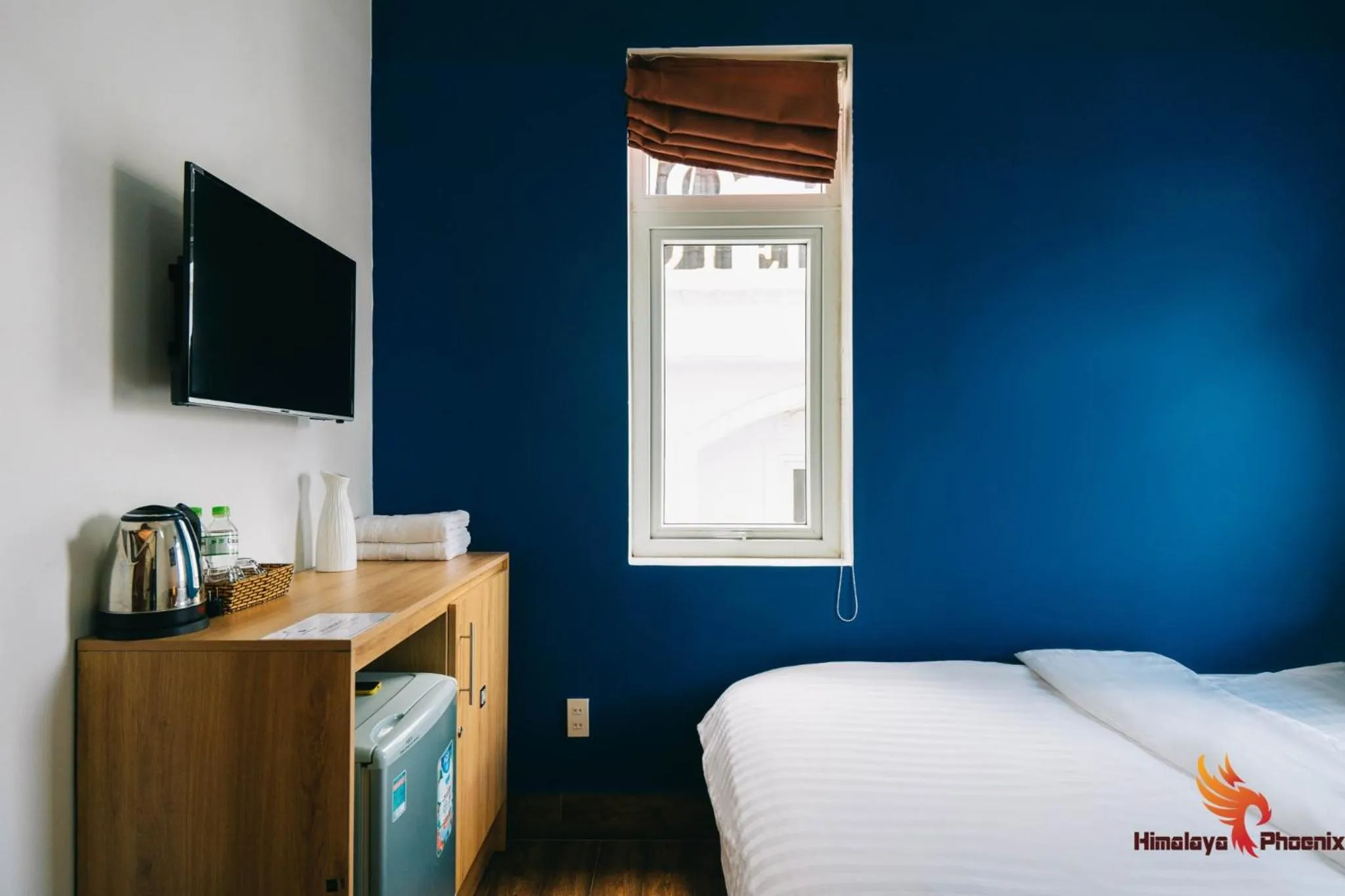 Bed in Himalaya Phoenix Hotel