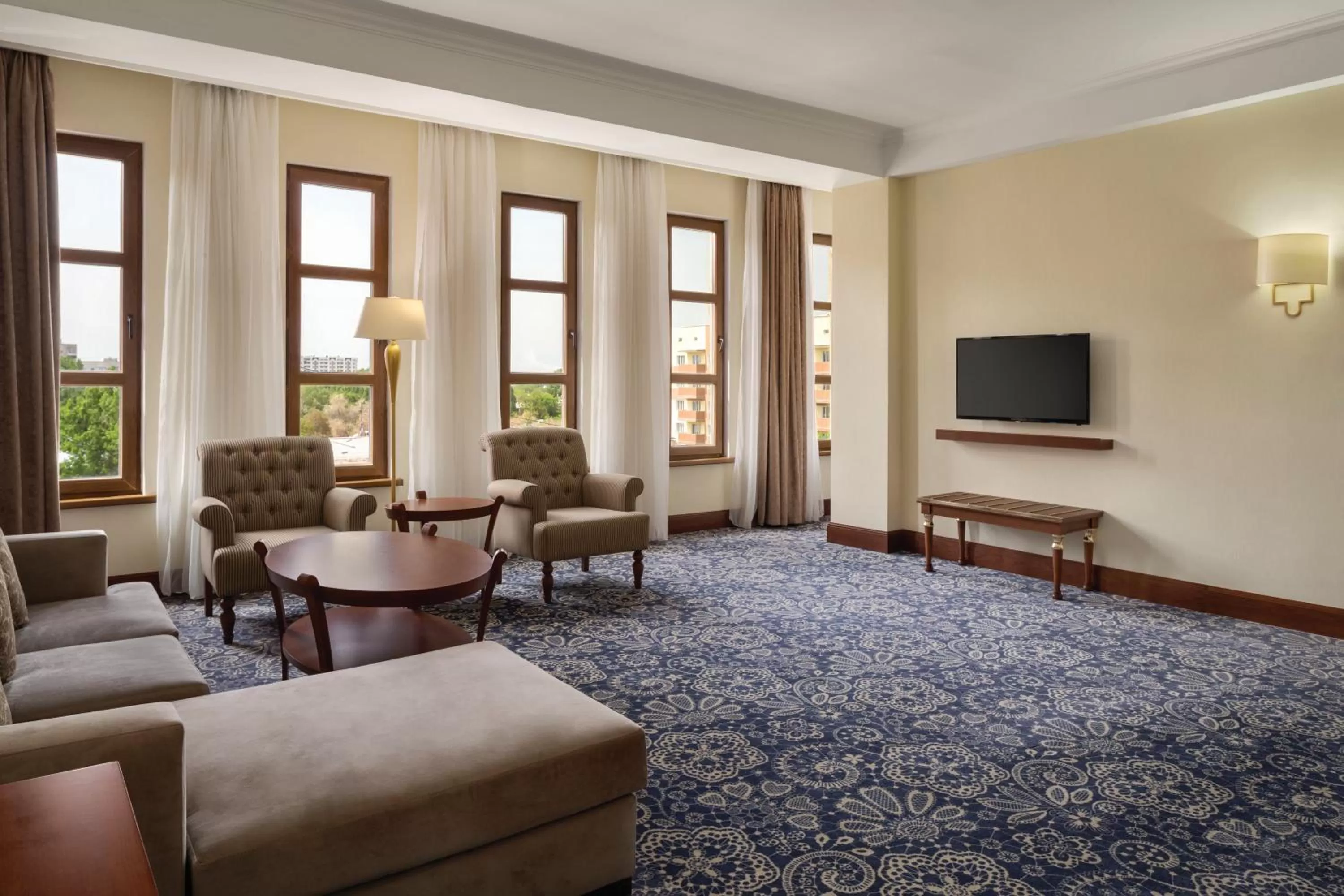 Living room in Ramada by Wyndham Almaty