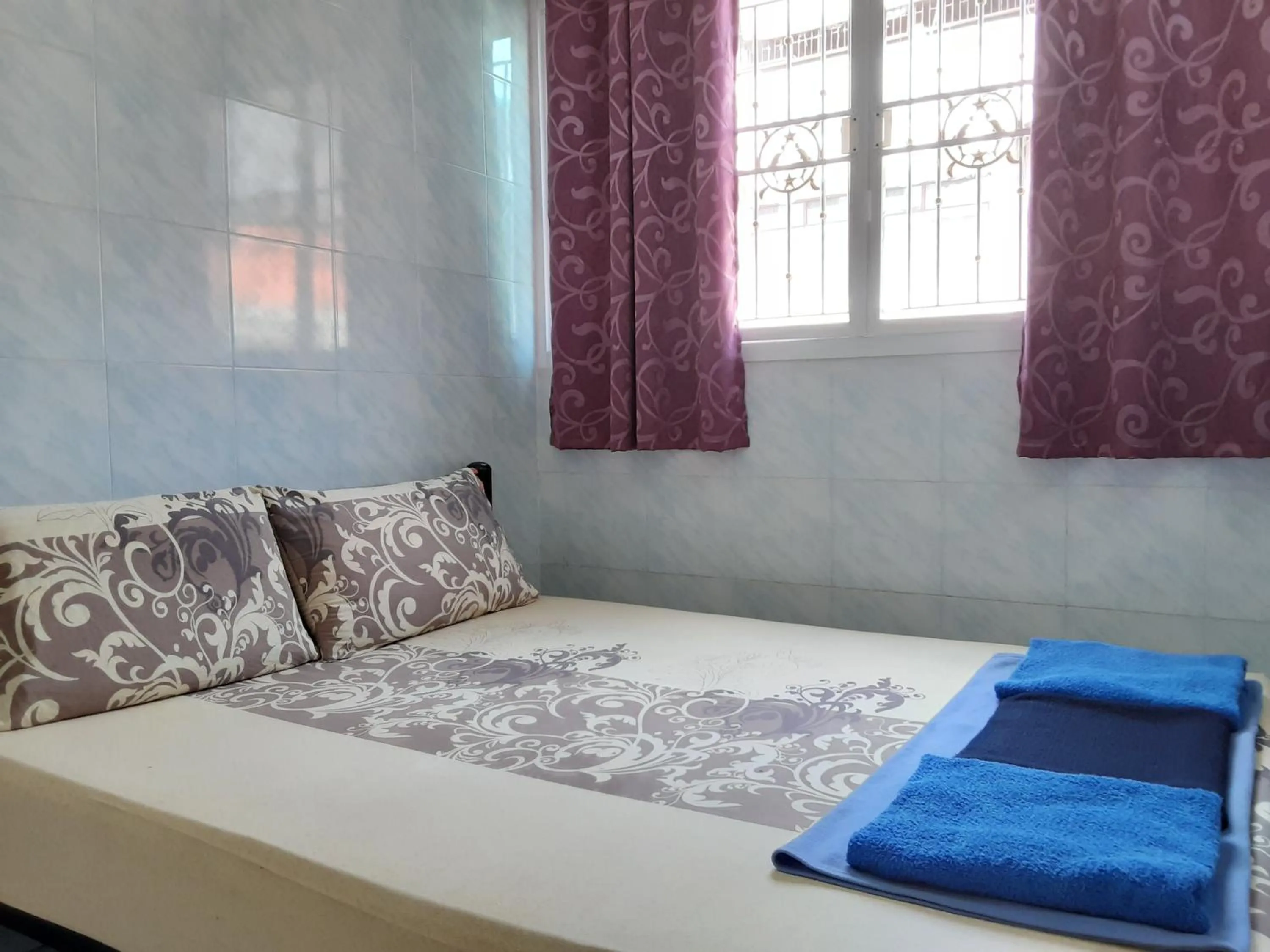 Bed in New Central Guesthouse