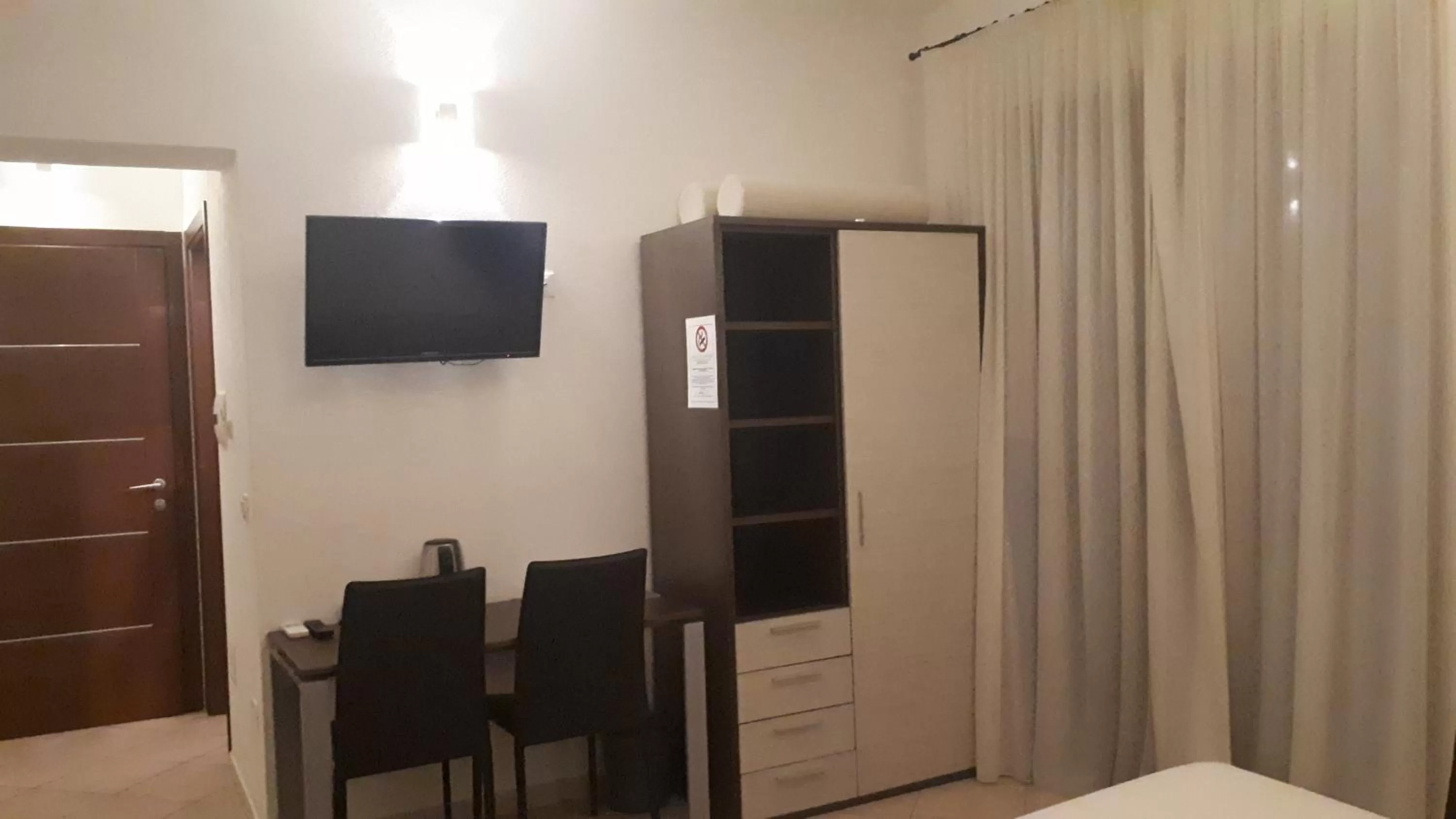 TV/Entertainment Center in Domo - Guest-House Il Nespolo Fiorito