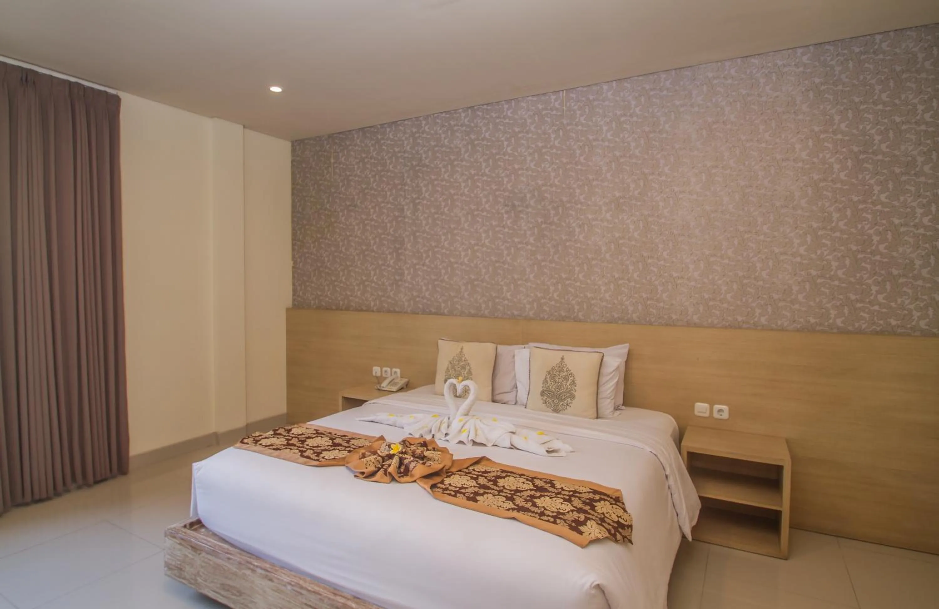 Bed in Mahalaksmi Boutique Hotel