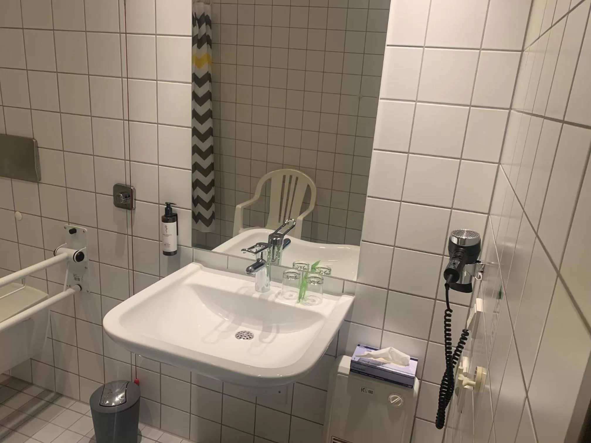 Bathroom in Vienna House Easy by Wyndham Amberg