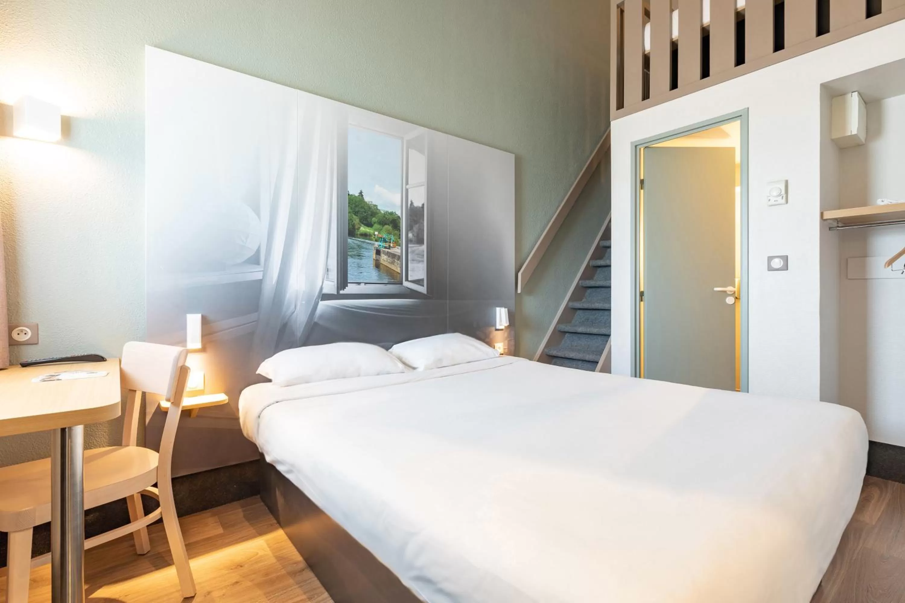 Bedroom, Bed in B&B HOTEL Laval Changé