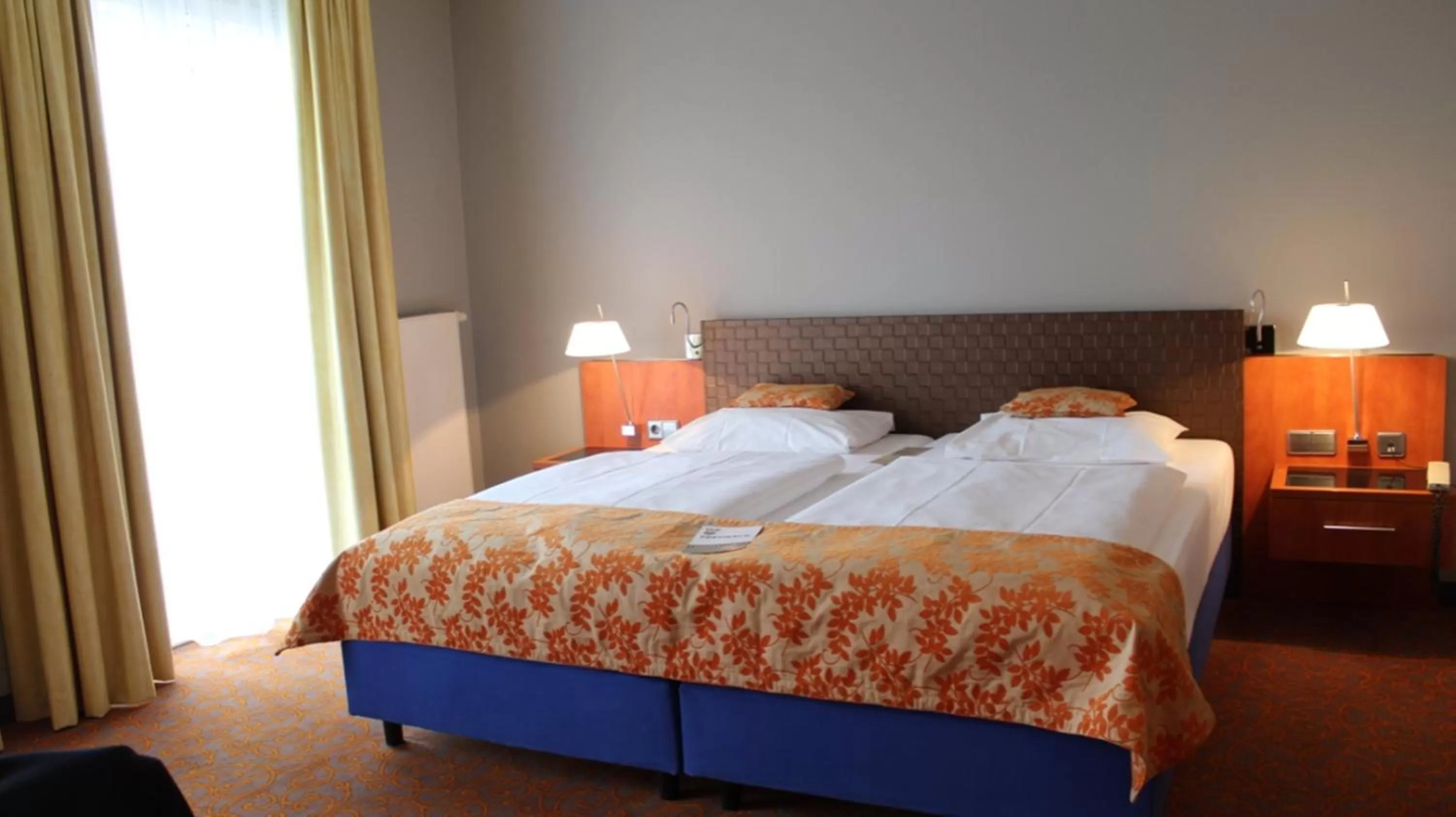 Bed in Mercure Hotel & Residenz Berlin Checkpoint Charlie