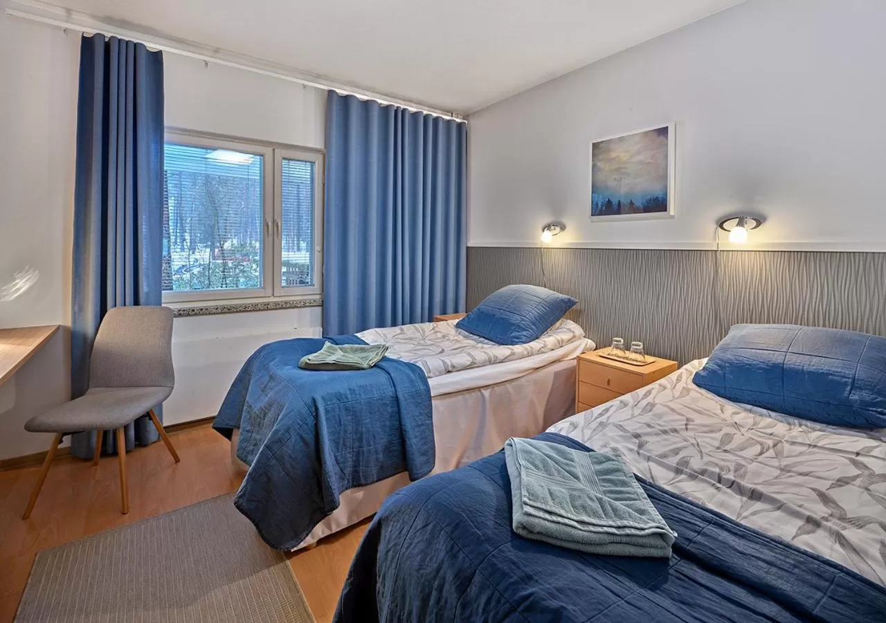 Photo of the whole room, Bed in Hotelli-Ravintola Gasthaus Lohja