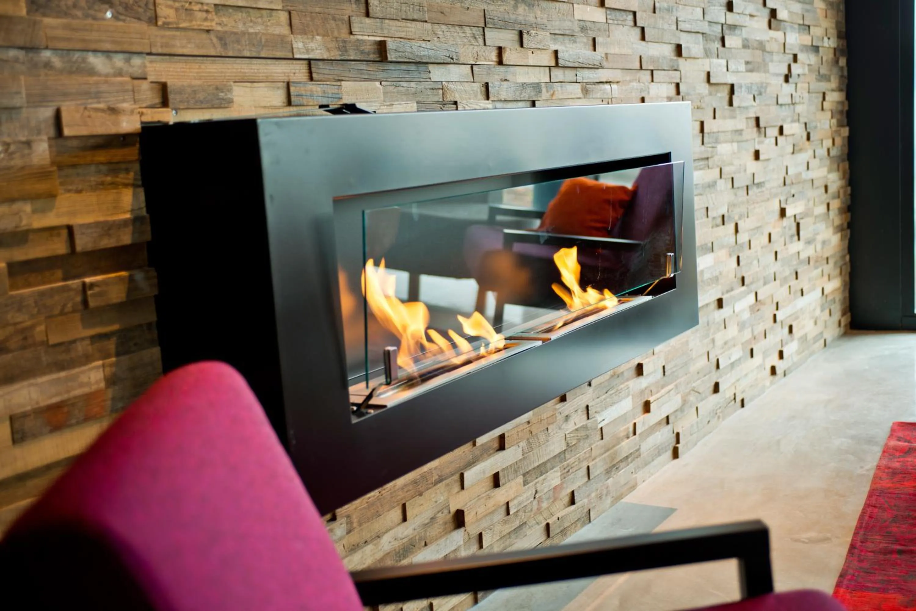 Communal lounge/ TV room in Nomad Hotel le Havre Centre Gare