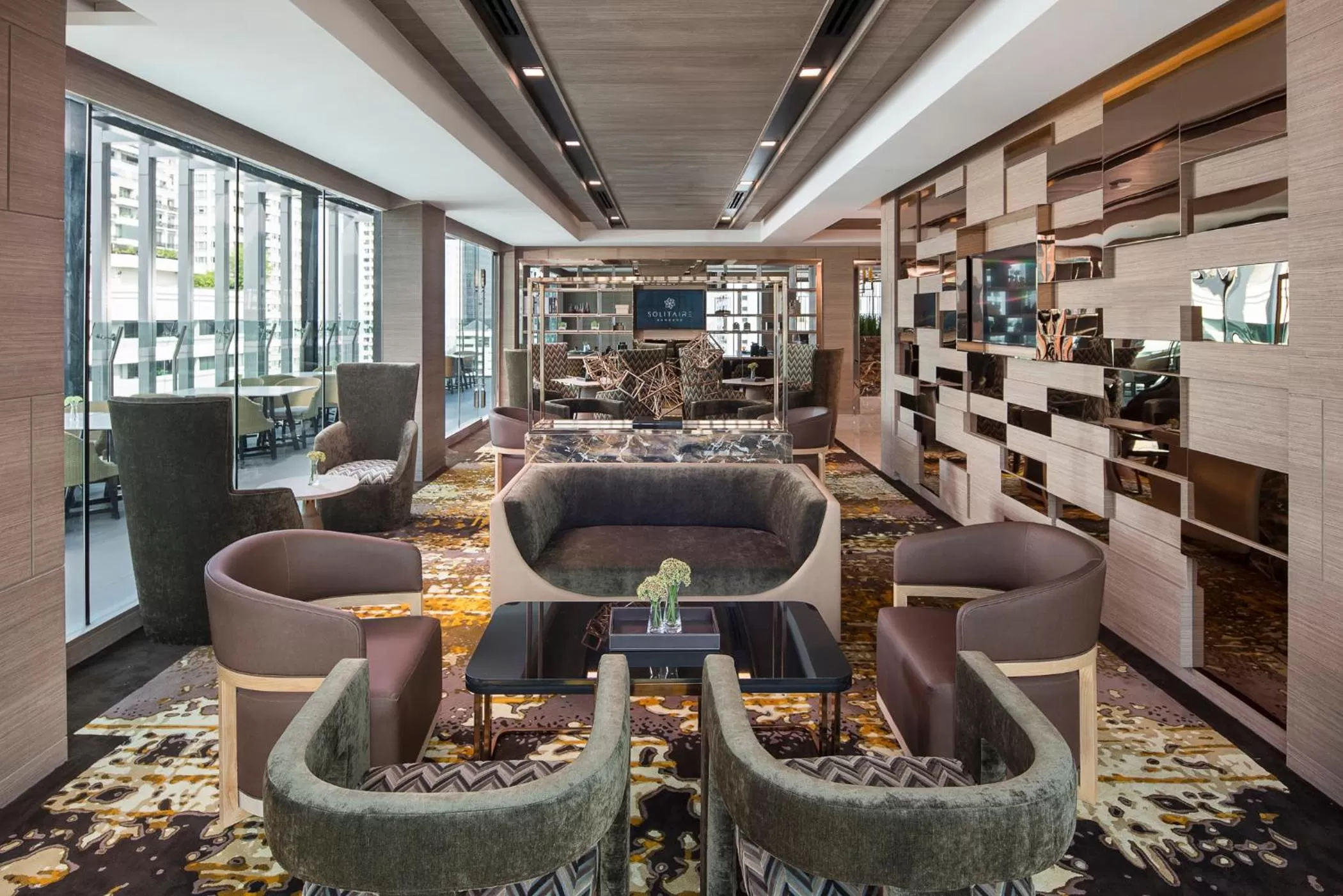 Communal lounge/ TV room in Solitaire Bangkok Sukhumvit 11