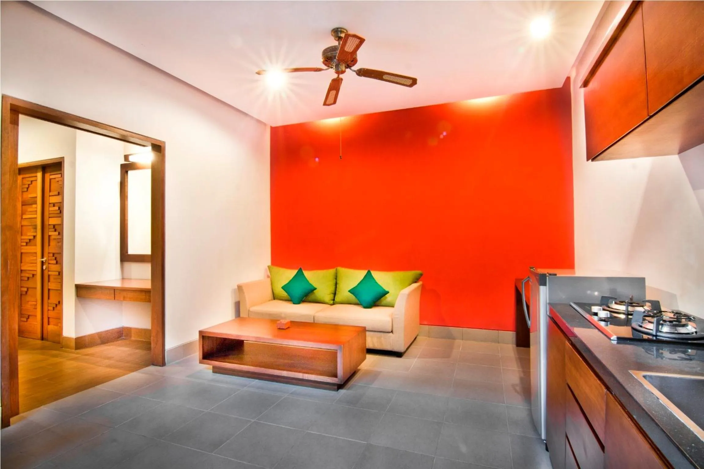 Seating area in The Green Zhurga Suite Seminyak