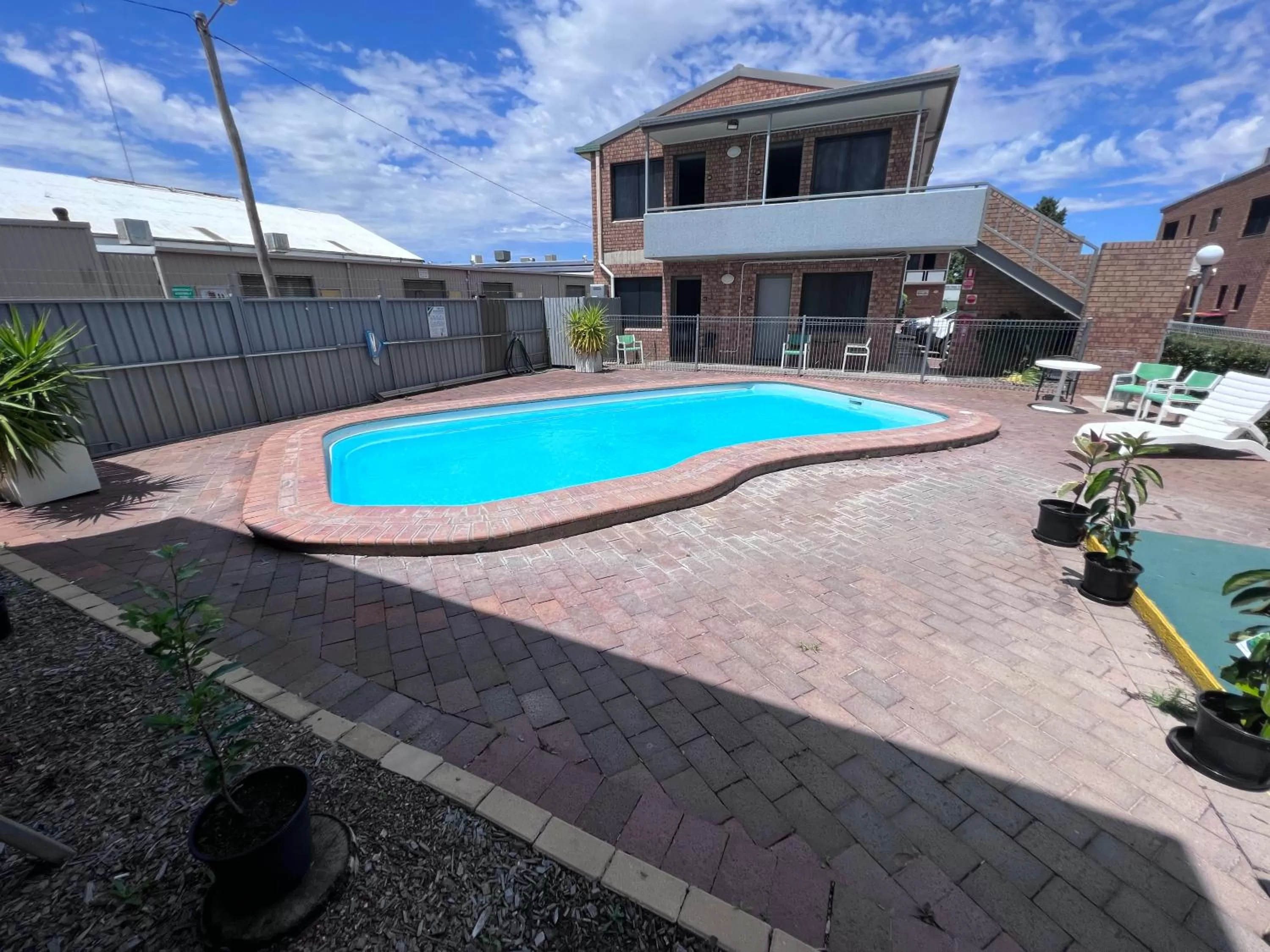 Swimming pool in Spa Village Travel Inn