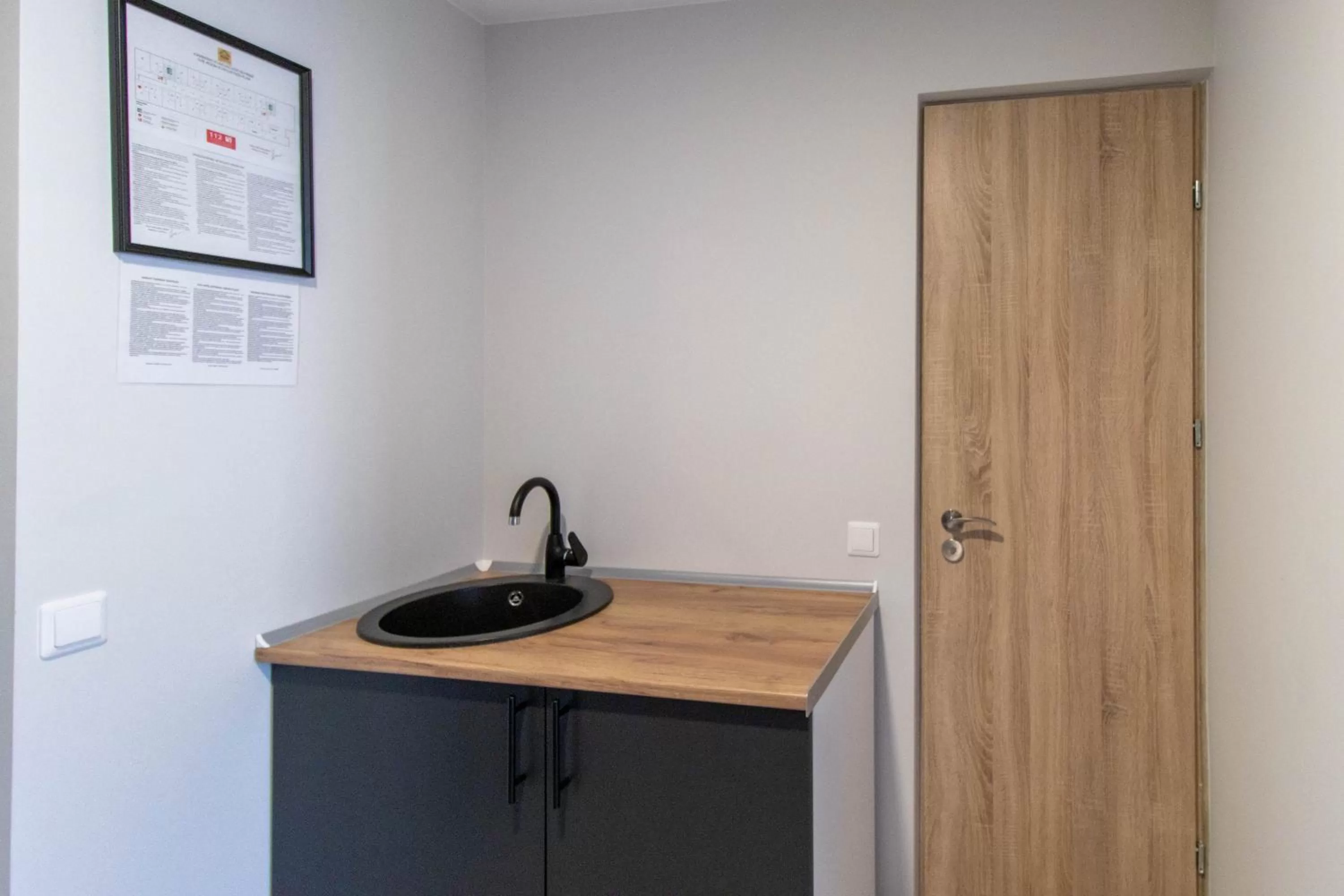 Kitchen/Kitchenette in Dzukija Hotel