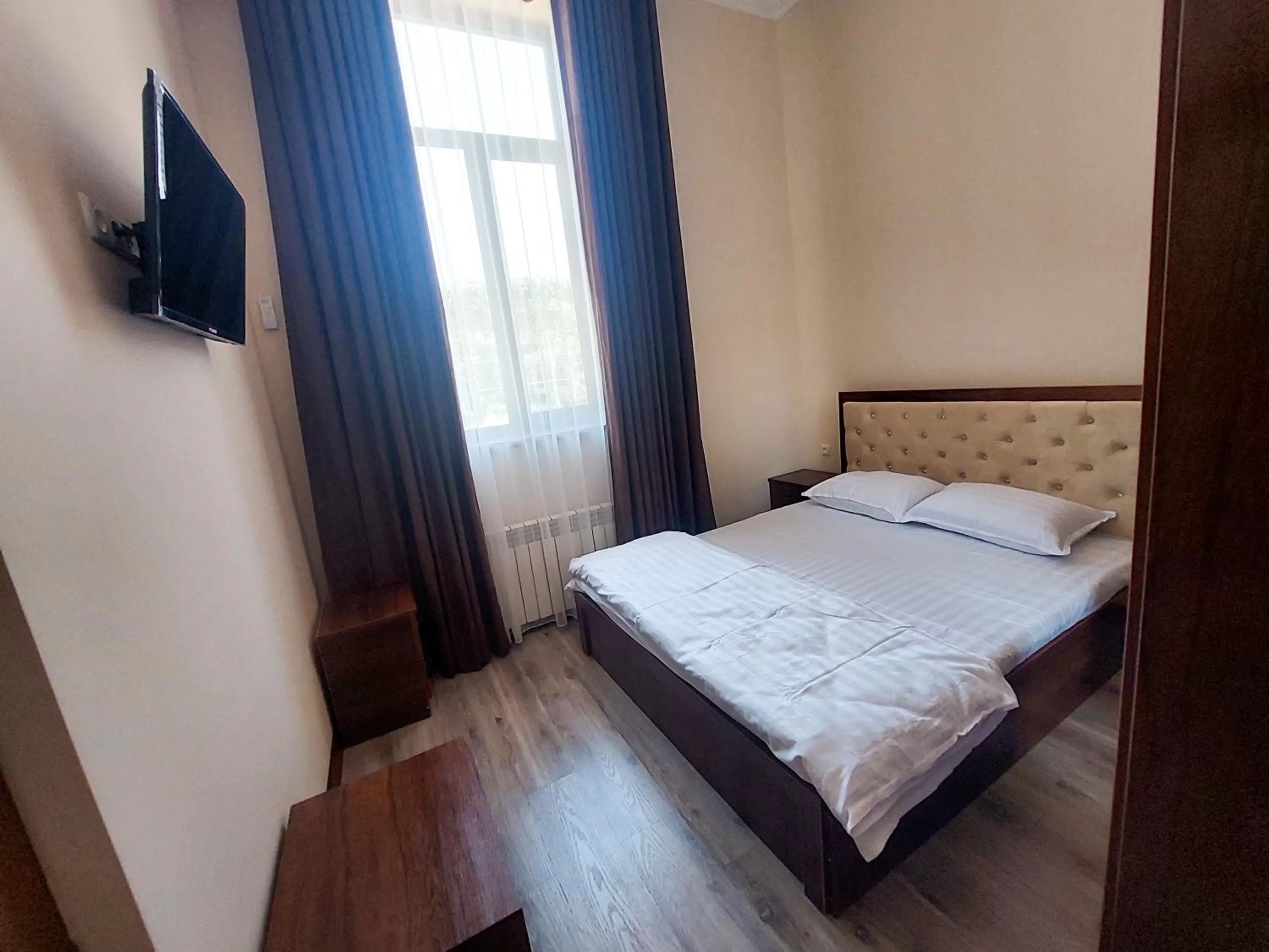 Photo of the whole room, Bed in Samarabonu Hotel
